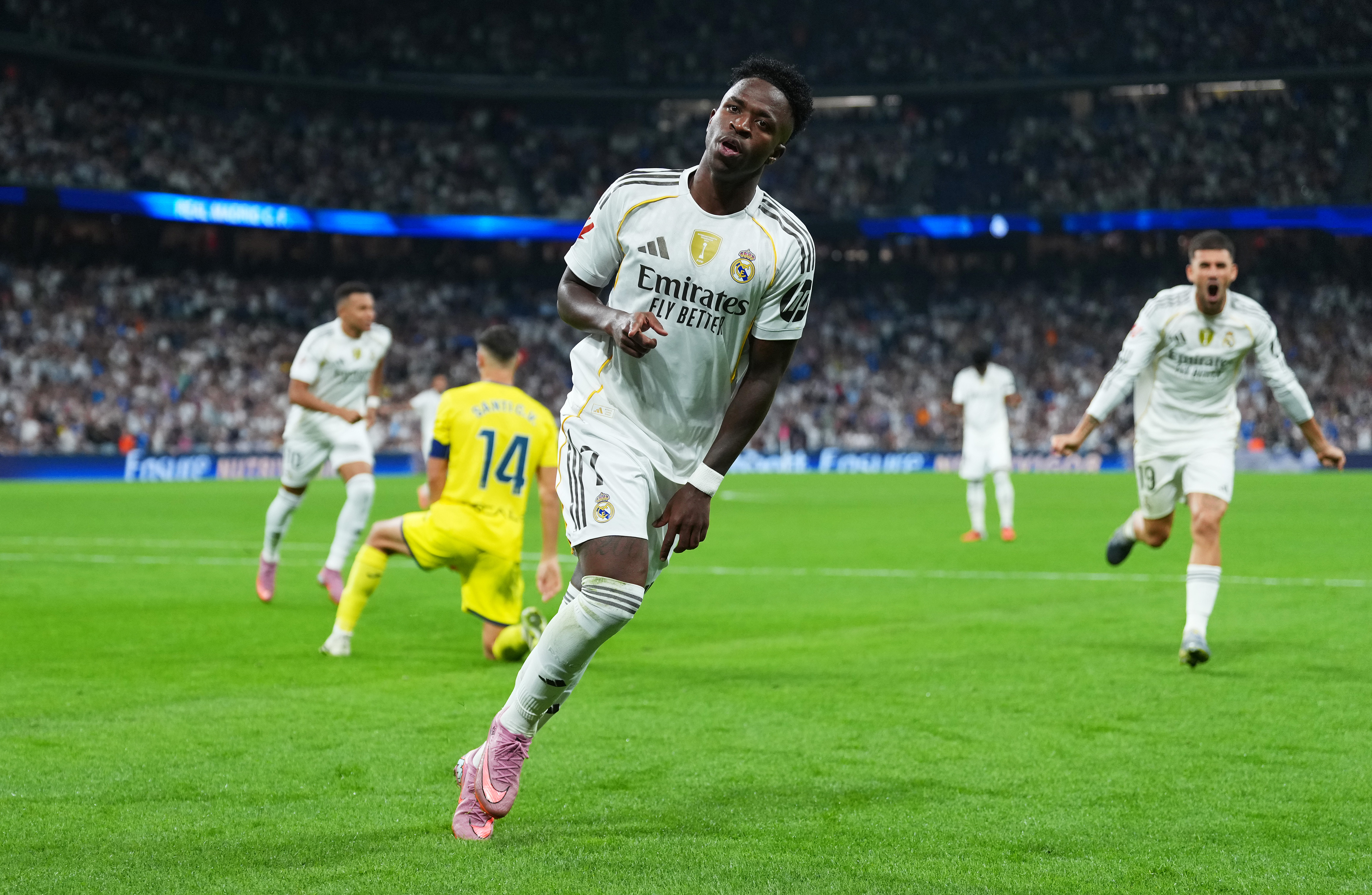 MADRID, SPAIN - OCTOBER 04: Vinicius Junior of Real Madrid celebrates scoring his team's first goal during the LaLiga EA Sports match between Real Madrid CF and Villarreal CF at Estadio Santiago Bernabeu on October 04, 2025 in Madrid, Spain. (Photo by Angel Martinez/Getty Images)