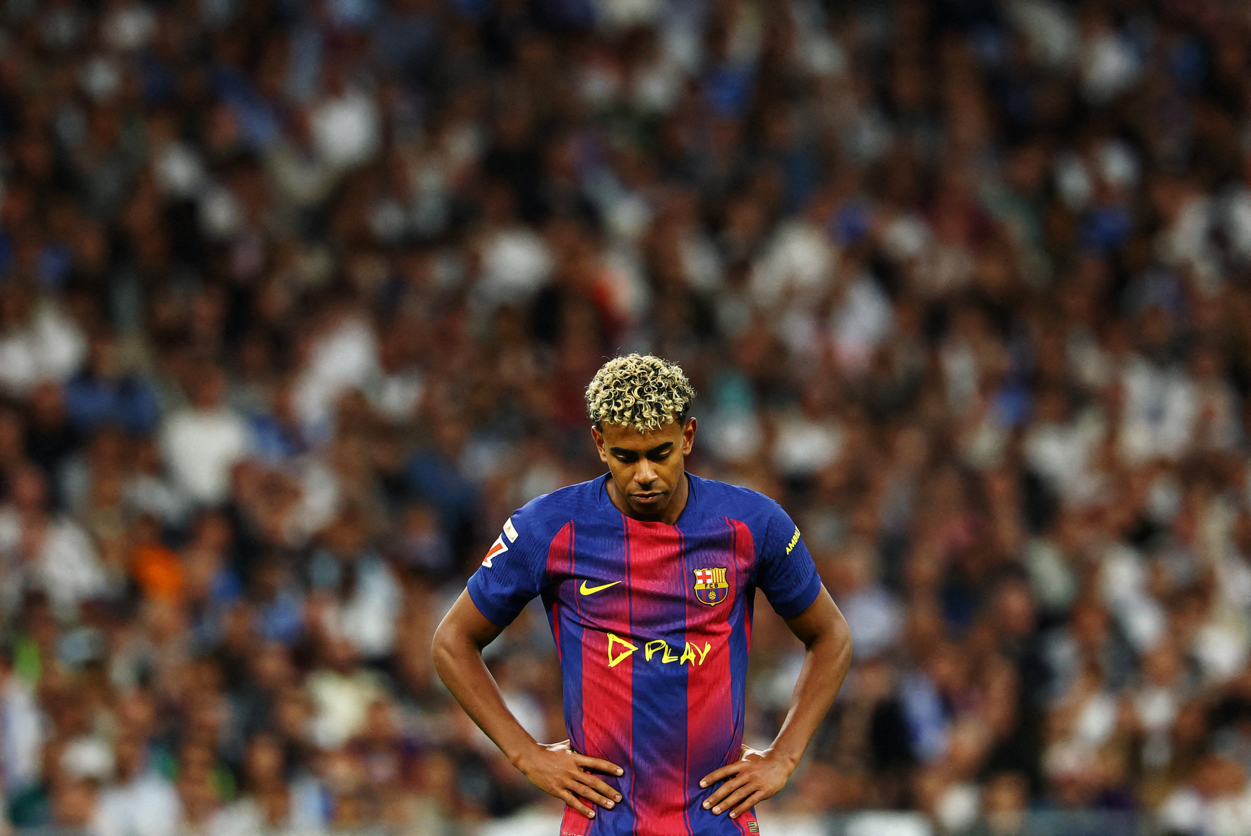 Soccer Football - LaLiga - Real Madrid v FC Barcelona - Santiago Bernabeu, Madrid, Spain - October 26, 2025 FC Barcelona's Lamine Yamal looks dejected REUTERS/Susana Vera TPX IMAGES OF THE DAY