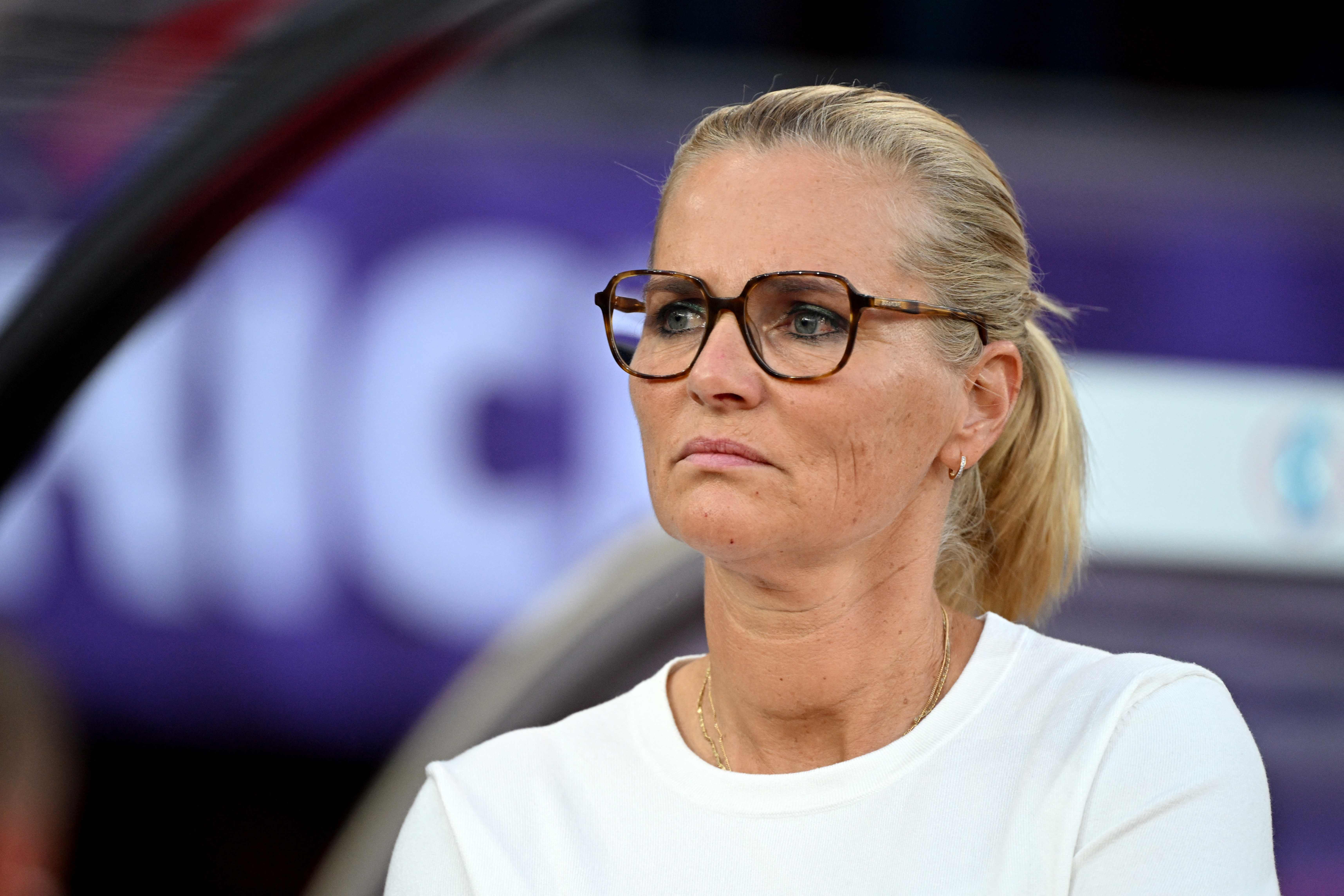 England's Dutch head oach Sarina Wiegman looks on prior to the start of the UEFA Women's Euro 2025 Group D football match between France and England at the Letzigrund Stadium in Zurich, on July 5, 2025. (Photo by Miguel MEDINA / AFP)
