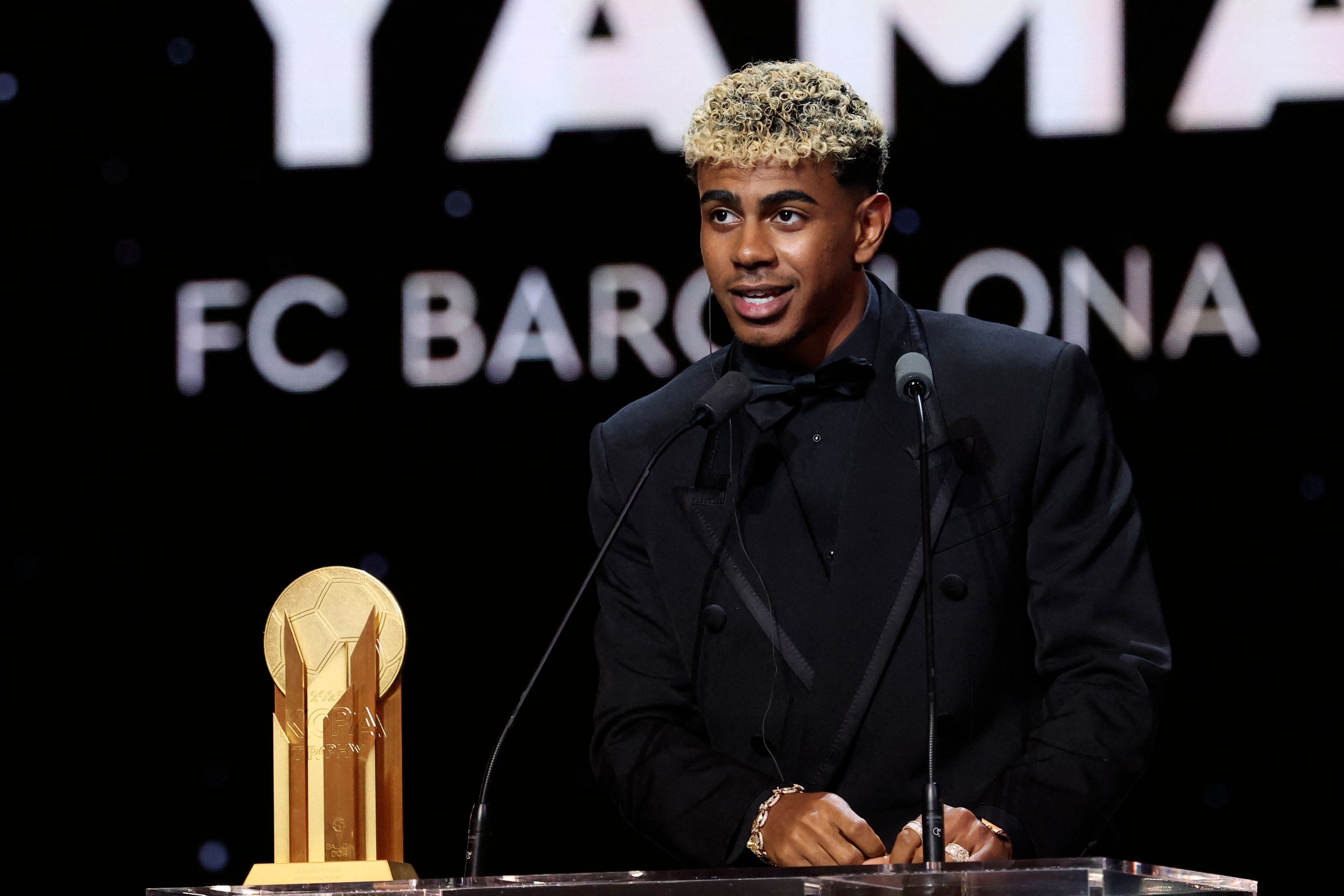 Barcelona's Spanish forward Lamine Yamal speaks after receiving the Kopa Trophy for the best under-21 player during the 2025 Ballon d'Or France Football award ceremony at the Theatre du Chatelet in Paris on September 22, 2025. (Photo by Franck FIFE / AFP)