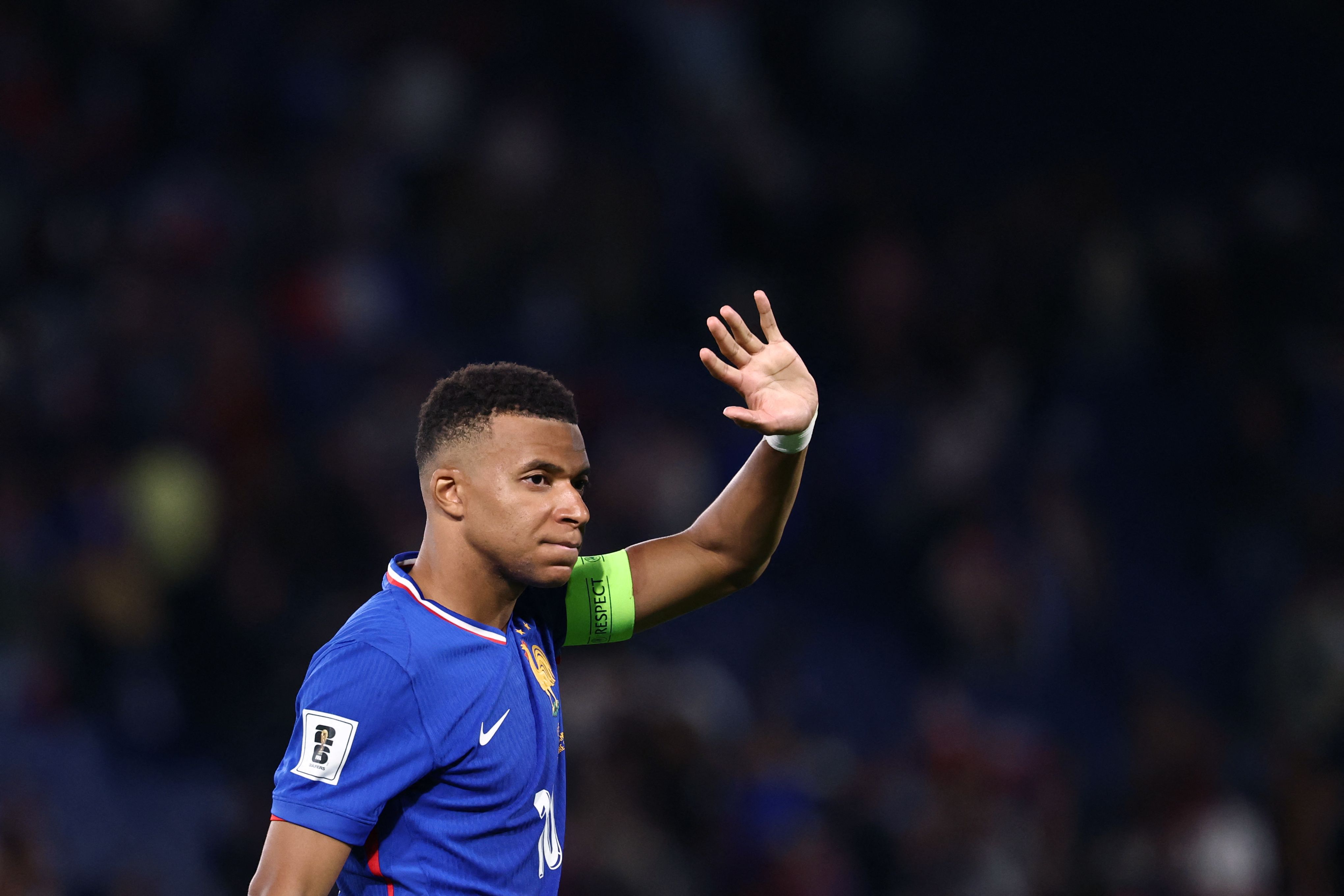 France's forward #10 Kylian Mbappe waves after winning the  FIFA World Cup 2026 Group D European qualification football match between France and Iceland at the Parc des Princes stadium in Paris, on September 9, 2025. (Photo by FRANCK FIFE / AFP)