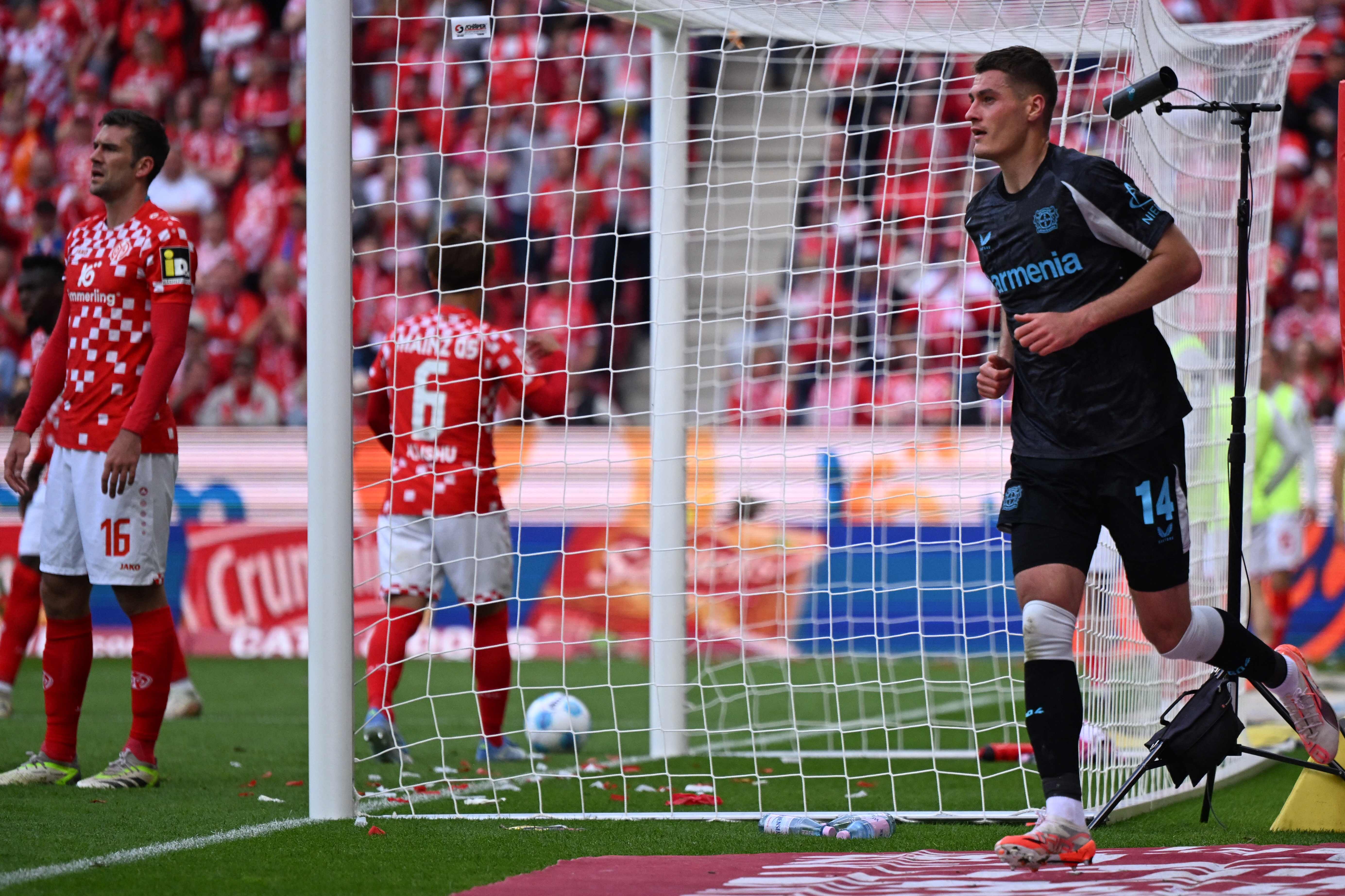 Bayer Leverkusen's Czech forward #14 Patrik Schick celebrates after scoring his team's second goal during the German first division Bundesliga football match between Mainz 05 and Bayer Leverkusen in Mainz, western Germany, on May 17, 2025. (Photo by Kirill KUDRYAVTSEV / AFP) / DFL REGULATIONS PROHIBIT ANY USE OF PHOTOGRAPHS AS IMAGE SEQUENCES AND/OR QUASI-VIDEO