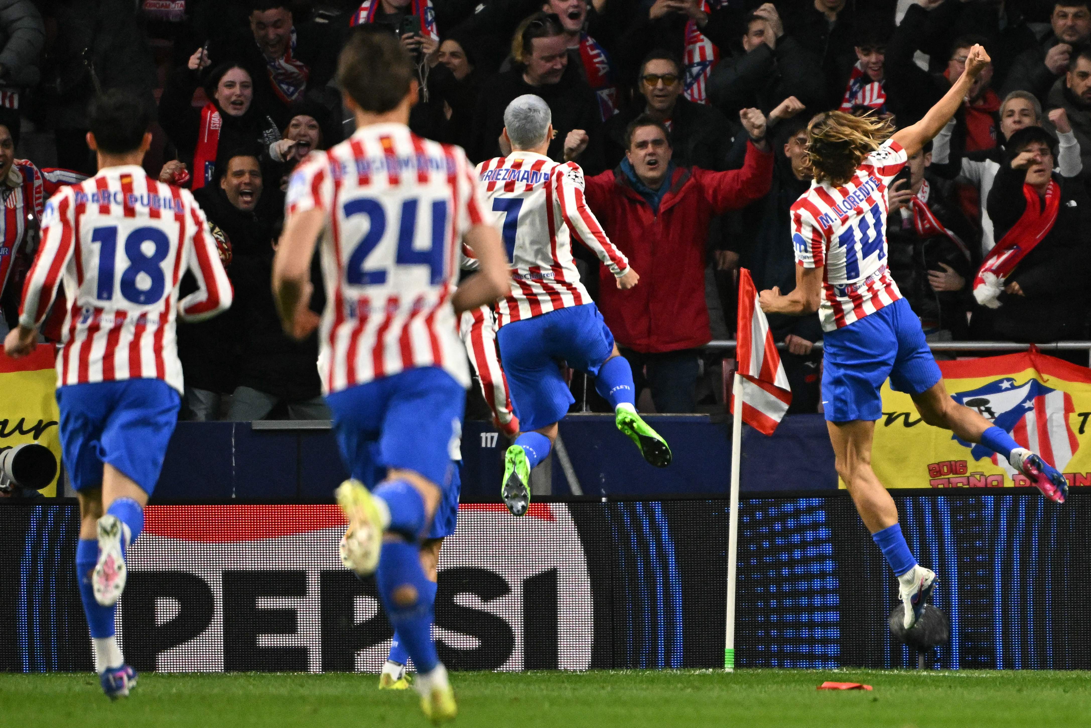 Atletico Madrid's Spanish midfielder #14 Marcos Llorente celebrates scoring the opening goal during the UEFA Champions League last 16 first leg football match between Club Atletico de Madrid and Tottenham Hotspur at Metropolitano Stadium in Madrid on March 10, 2026. (Photo by Javier SORIANO / AFP)