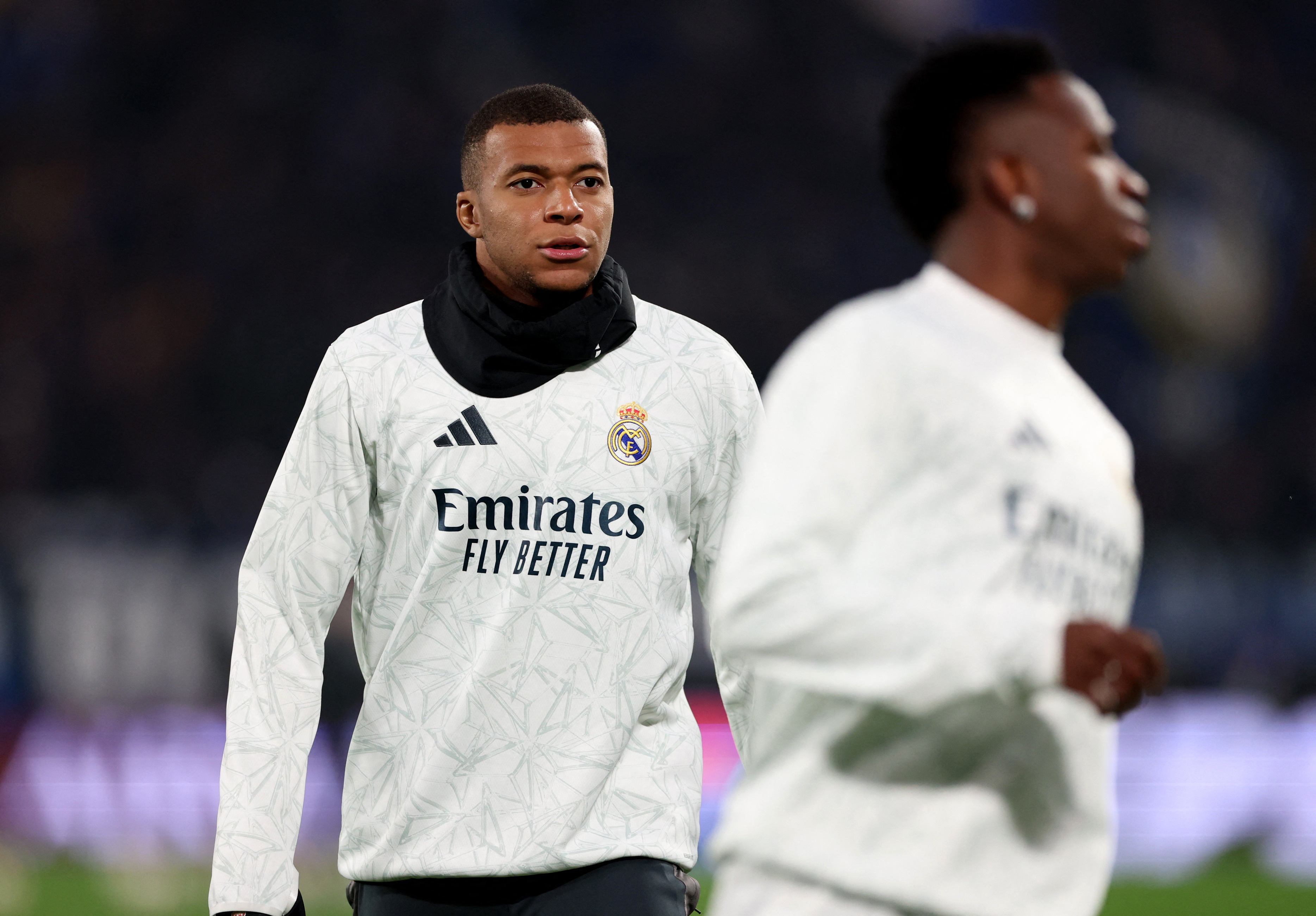 Soccer Football - Champions League - Atalanta v Real Madrid - Gewiss Stadium, Bergamo, Italy - December 10, 2024 Real Madrid's Kylian Mbappe and Vinicius Junior during the warm up before the match REUTERS/Claudia Greco