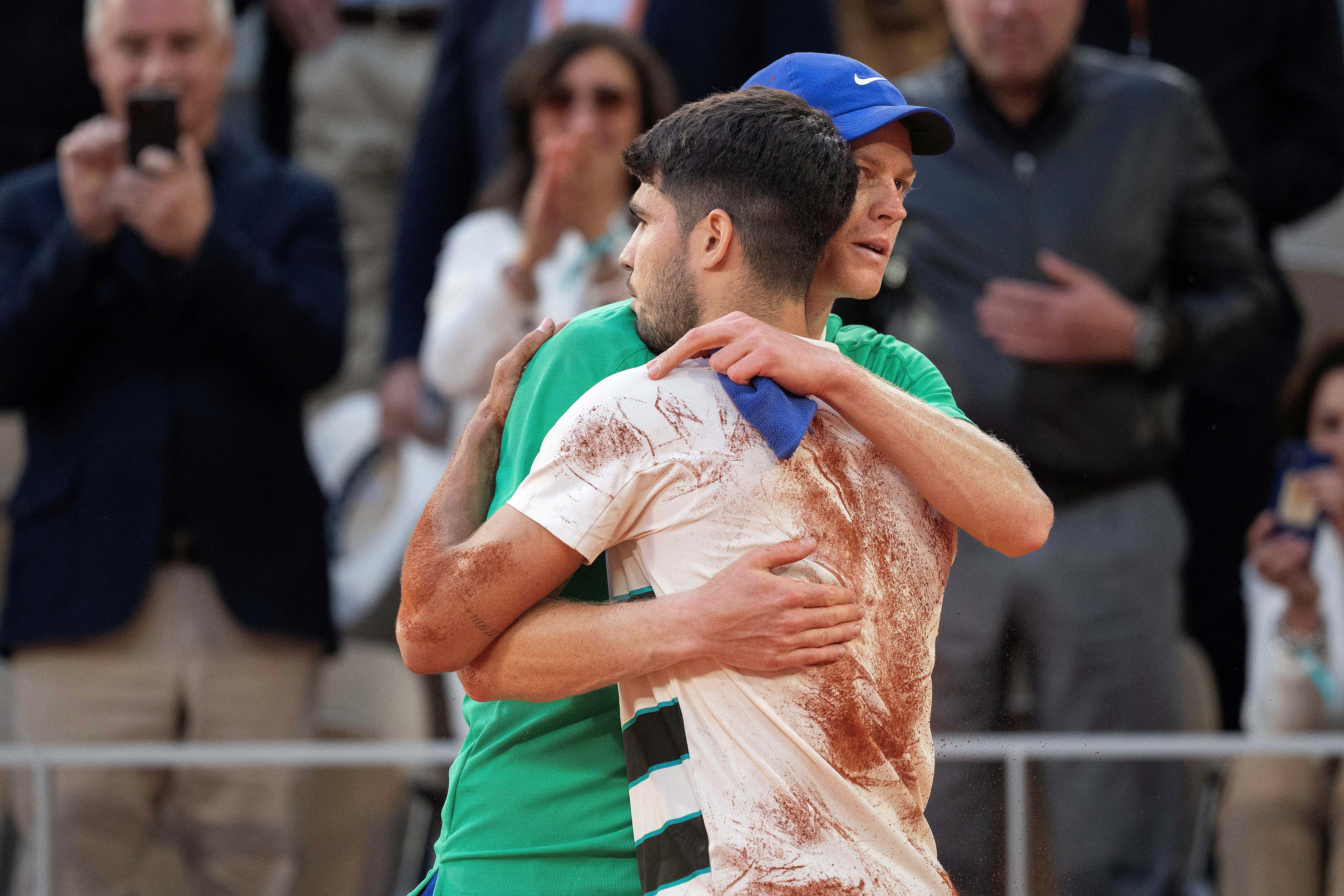 FILE PHOTO: Jun 8, 2025; Paris, FR;  Carlos Alcaraz of Spain and Jannik Sinner of Italy after the men’s singles final match on day 15 at Roland Garros Stadium.  Mandatory Credit: Susan Mullane-Imagn Images/File Photo