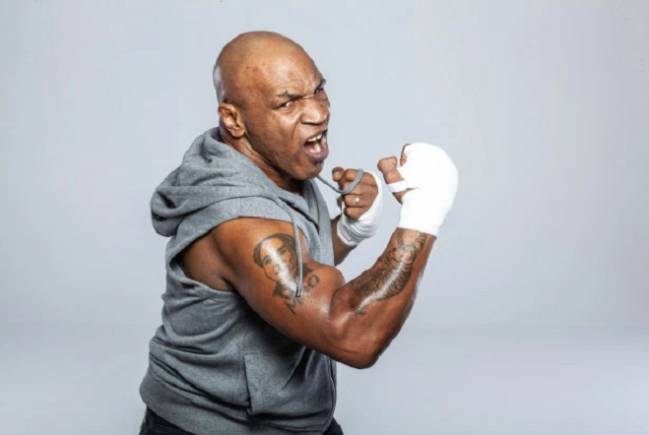 Mike Tyson had his face tattooed 'in bid to avoid fighting' at end of his  career - Mirror Online