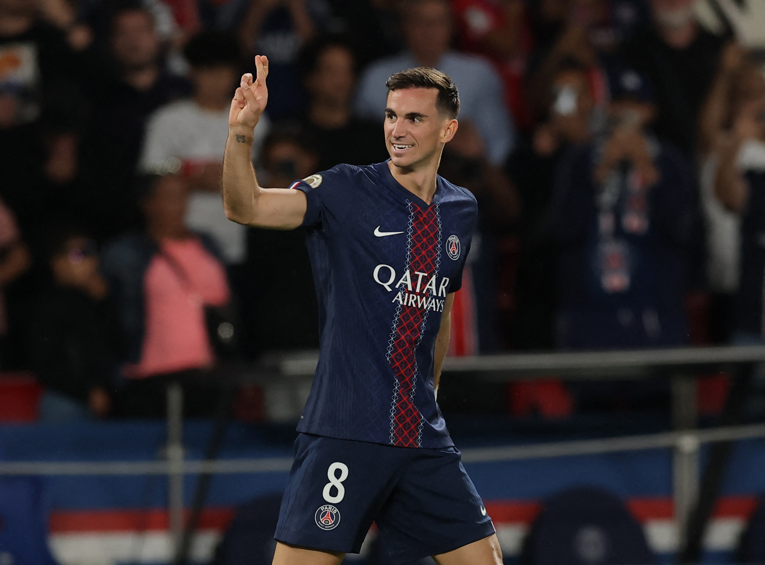 Soccer Football - Ligue 1 - Paris St Germain v Angers SCO - Parc des Princes, Paris, France - August 22, 2025  Paris St Germain's Fabian Ruiz celebrates scoring their first goal REUTERS/Christian Hartmann