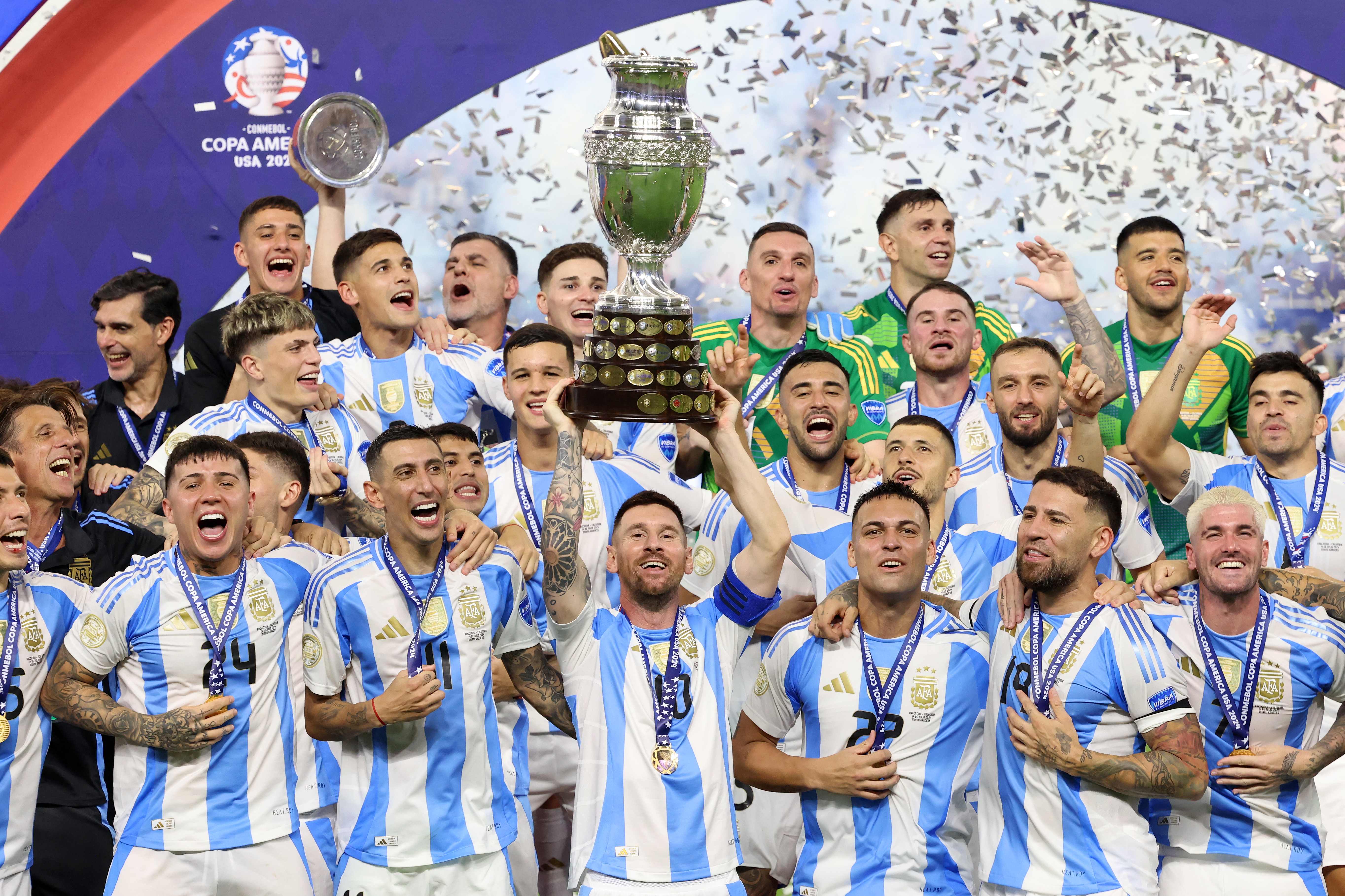 Argentina's forward #10 Lionel Messi lifts up the trophy as he celebrates winning the Conmebol 2024 Copa America tournament final football match between Argentina and Colombia at the Hard Rock Stadium, in Miami, Florida on July 14, 2024. (Photo by CHARLY TRIBALLEAU / AFP)