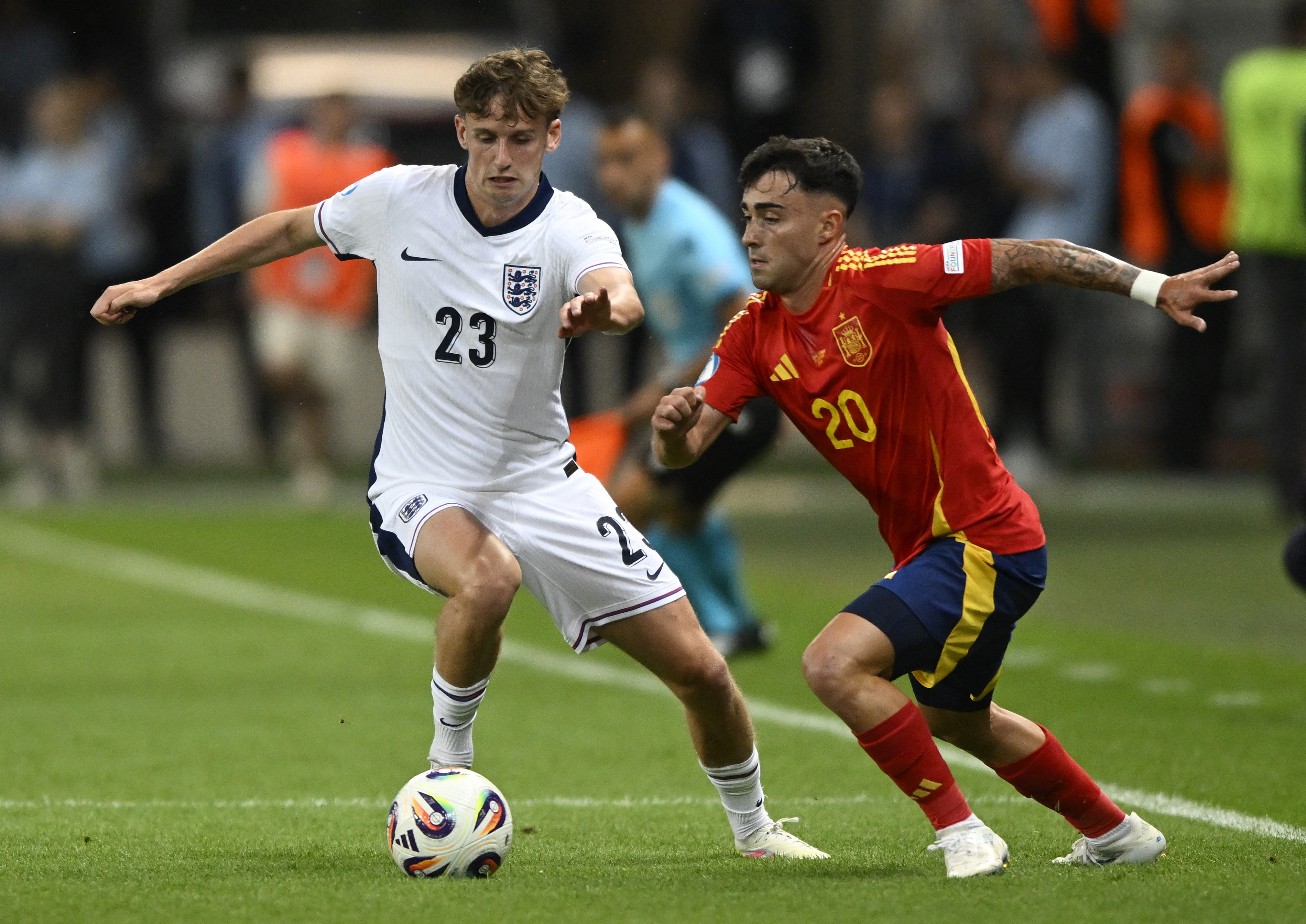 Soccer Football - UEFA Under 21 Championship - Quarter Final - England v Spain - Anton Malatinsky Stadium, Trnava, Slovakia - June 21, 2025 England's Tyler Morton in action with Spain's Alberto Moleiro REUTERS/Radovan Stoklasa