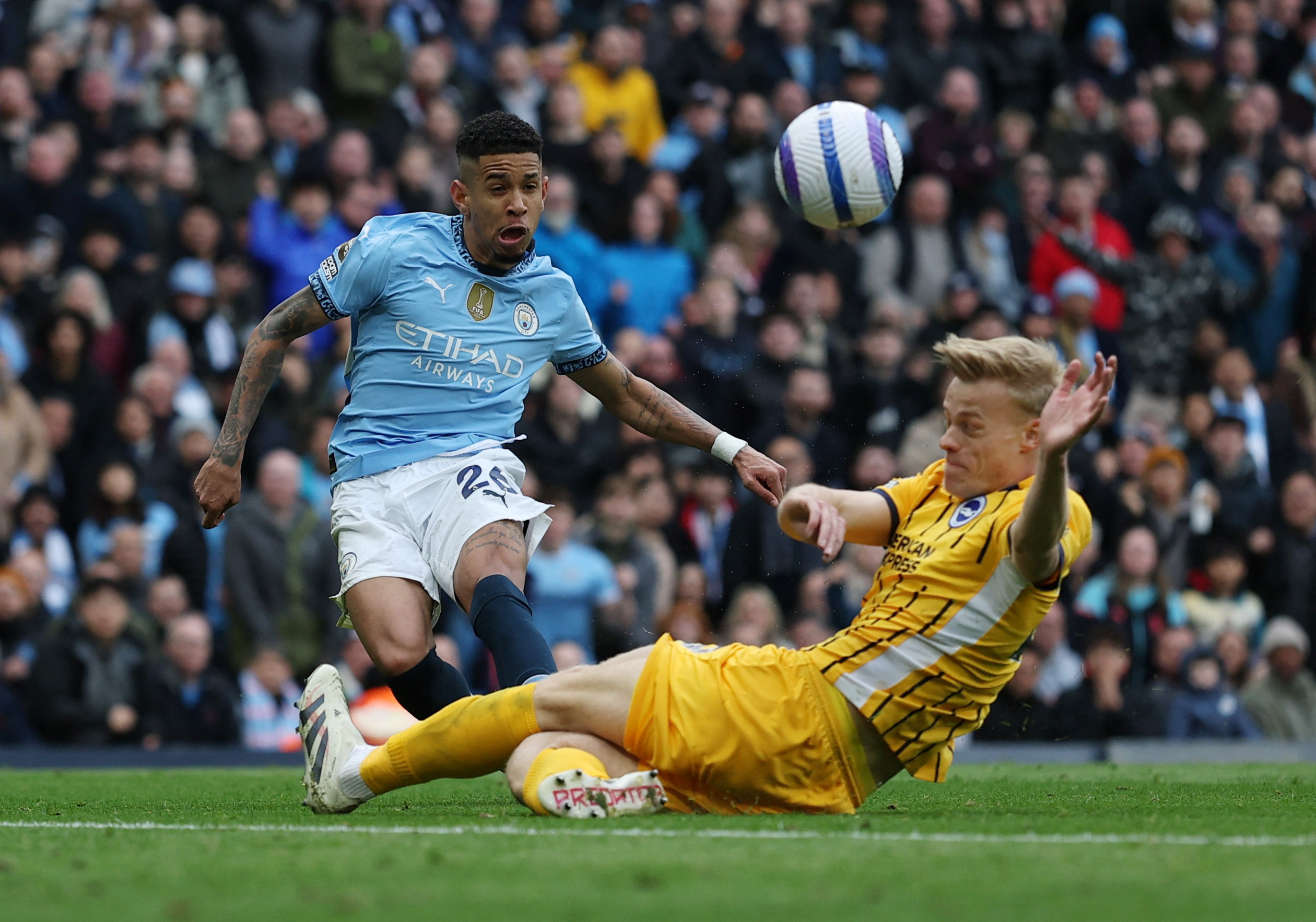 Soccer Football - Premier League - Manchester City v Brighton & Hove Albion - Etihad Stadium, Manchester, Britain - March 15, 2025 Manchester City's Savinho in action with Brighton & Hove Albion's Jan Paul van Hecke Action Images via Reuters/Lee Smith EDITORIAL USE ONLY. NO USE WITH UNAUTHORIZED AUDIO, VIDEO, DATA, FIXTURE LISTS, CLUB/LEAGUE LOGOS OR 'LIVE' SERVICES. ONLINE IN-MATCH USE LIMITED TO 120 IMAGES, NO VIDEO EMULATION. NO USE IN BETTING, GAMES OR SINGLE CLUB/LEAGUE/PLAYER PUBLICATIONS. PLEASE CONTACT YOUR ACCOUNT REPRESENTATIVE FOR FURTHER DETAILS..