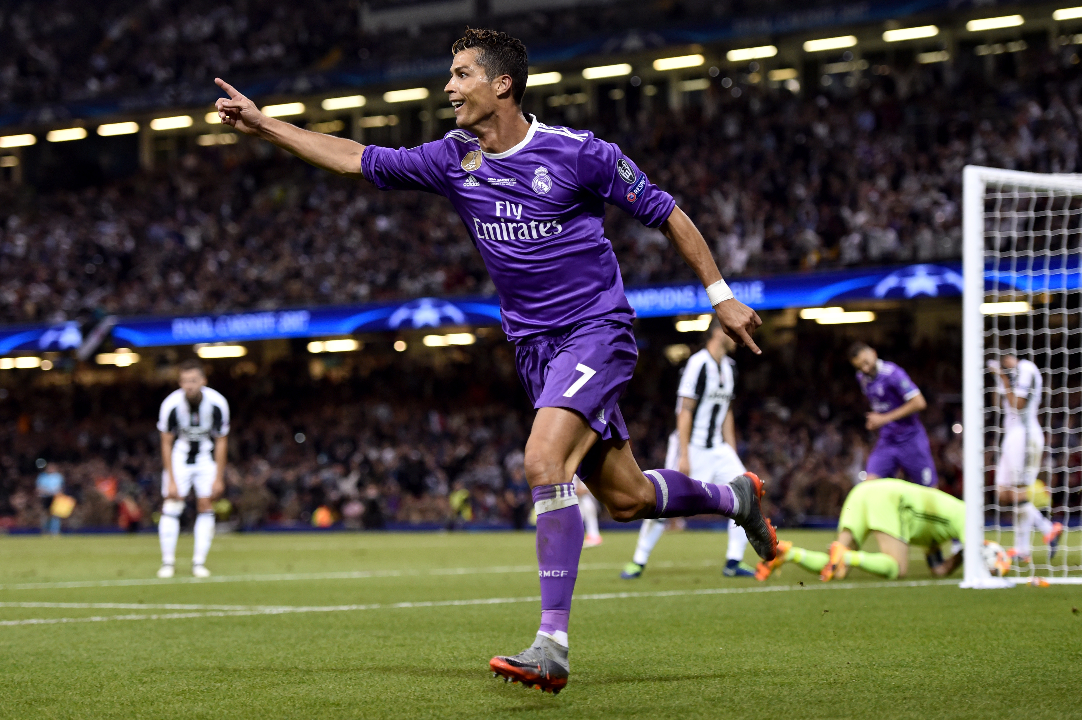 CARDIFF, WALES - JUNE 03: Cristiano Ronaldo of Real Madrid celebrates scoring his sides third goal during the UEFA Champions League Final between Juventus and Real Madrid at National Stadium of Wales on June 3, 2017 in Cardiff, Wales. (Photo by Denis Doyle - UEFA/UEFA via Getty Images)