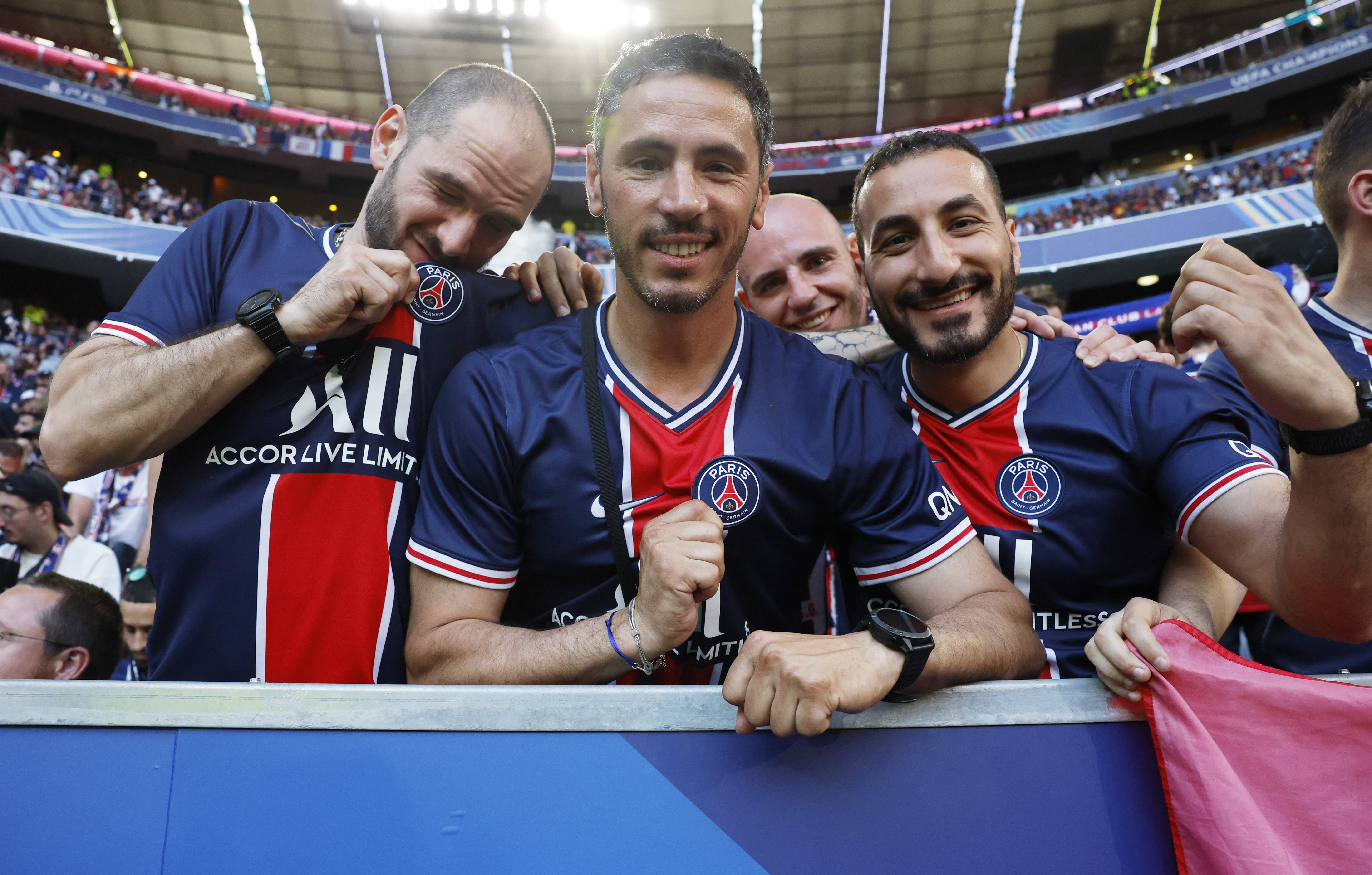 Soccer Football - Champions League - Final - Paris St Germain v Inter Milan - Allianz Arena, Munich, Germany - May 31, 2025 Paris St Germain fans react inside the stadium before the match REUTERS/Stephanie Lecocq