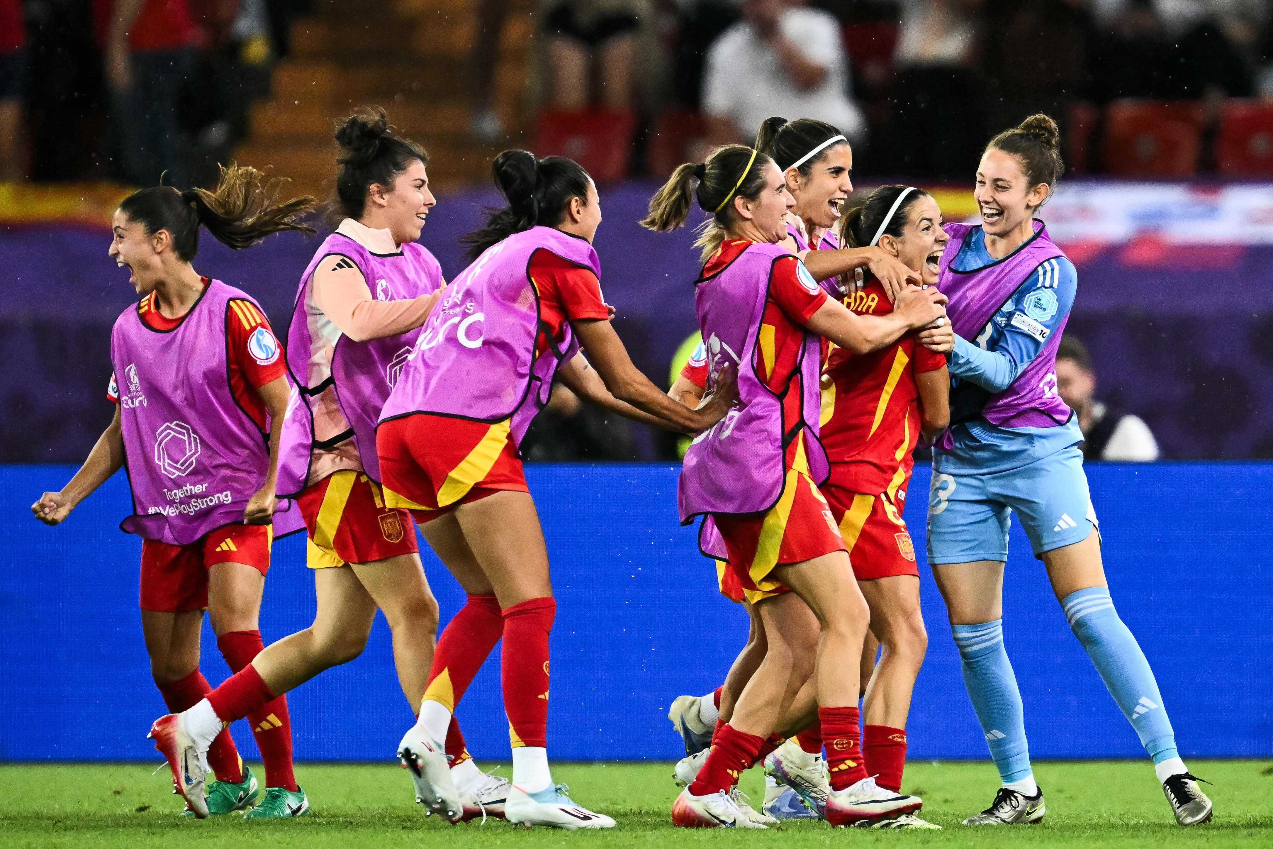 Spain's midfielder #06 Aitana Bonmati (2R) celebrates with teammates after scoring Spain's first goal during the UEFA Women's Euro 2025 semi-final football match between Germany and Spain at the Letzigrund Stadium in Zurich, on July 23, 2025. (Photo by Fabrice COFFRINI / AFP)