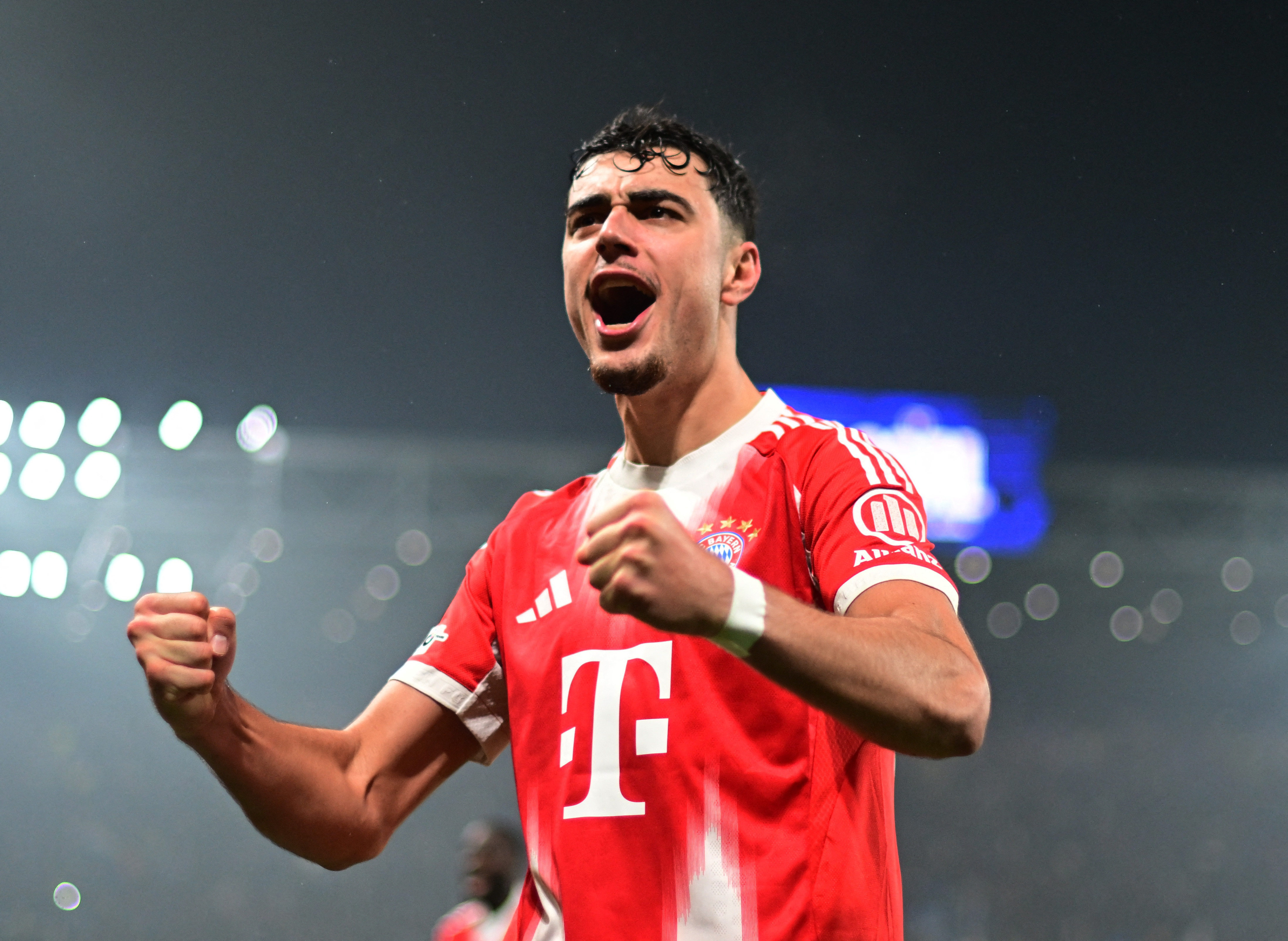 Soccer Football - UEFA Champions League - Round of 16 - First Leg - Atalanta v Bayern Munich - New Balance Arena, Bergamo, Italy - March 10, 2026 Bayern Munich's Aleksandar Pavlovic celebrates Nicolas Jackson scoring their fourth goal REUTERS/Daniele Mascolo