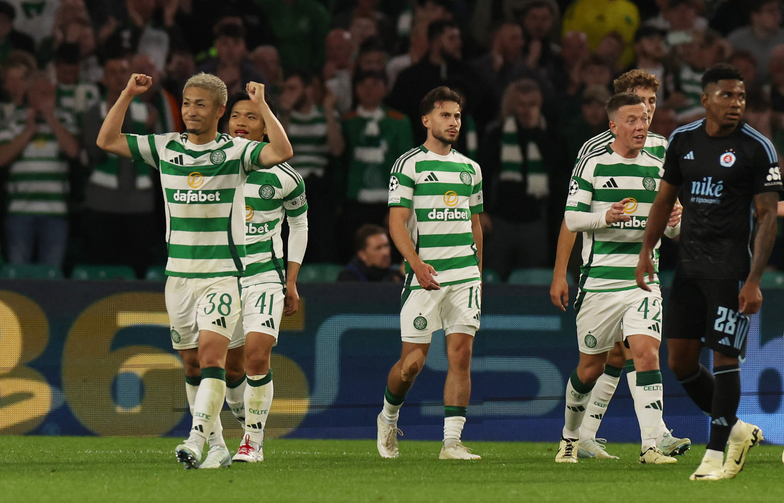 Soccer Football - Champions League - Celtic v Slovan Bratislava - Celtic Park, Glasgow, Scotland, Britain - September 18, 2024 Celtic's Daizen Maeda celebrates scoring their fourth goal REUTERS/Russell Cheyne