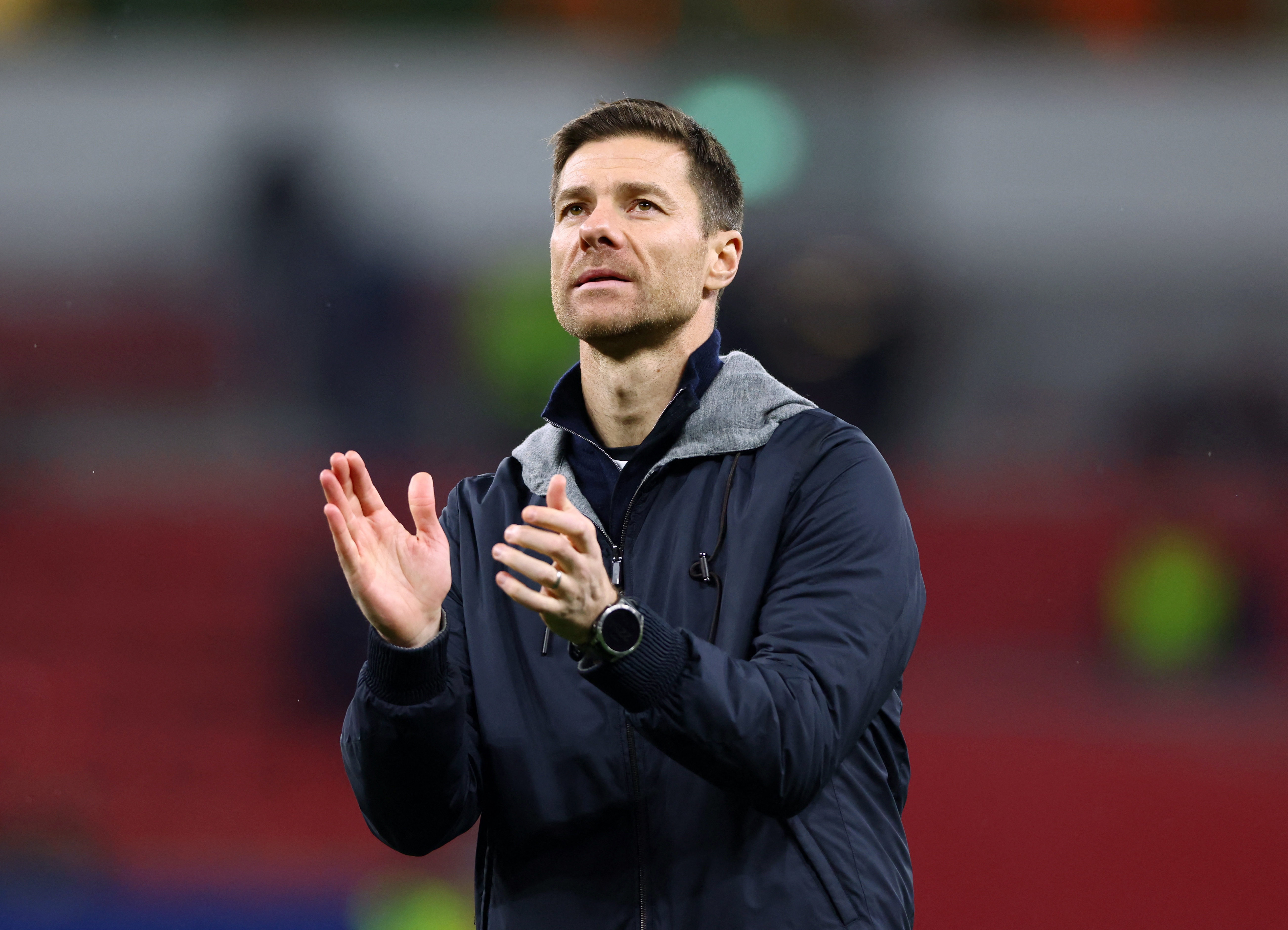 Soccer Football - Champions League - Bayer Leverkusen v FC Salzburg - BayArena, Leverkusen, Germany - November 26, 2024 Bayer Leverkusen coach Xabi Alonso applauds fans after the match REUTERS/Thilo Schmuelgen