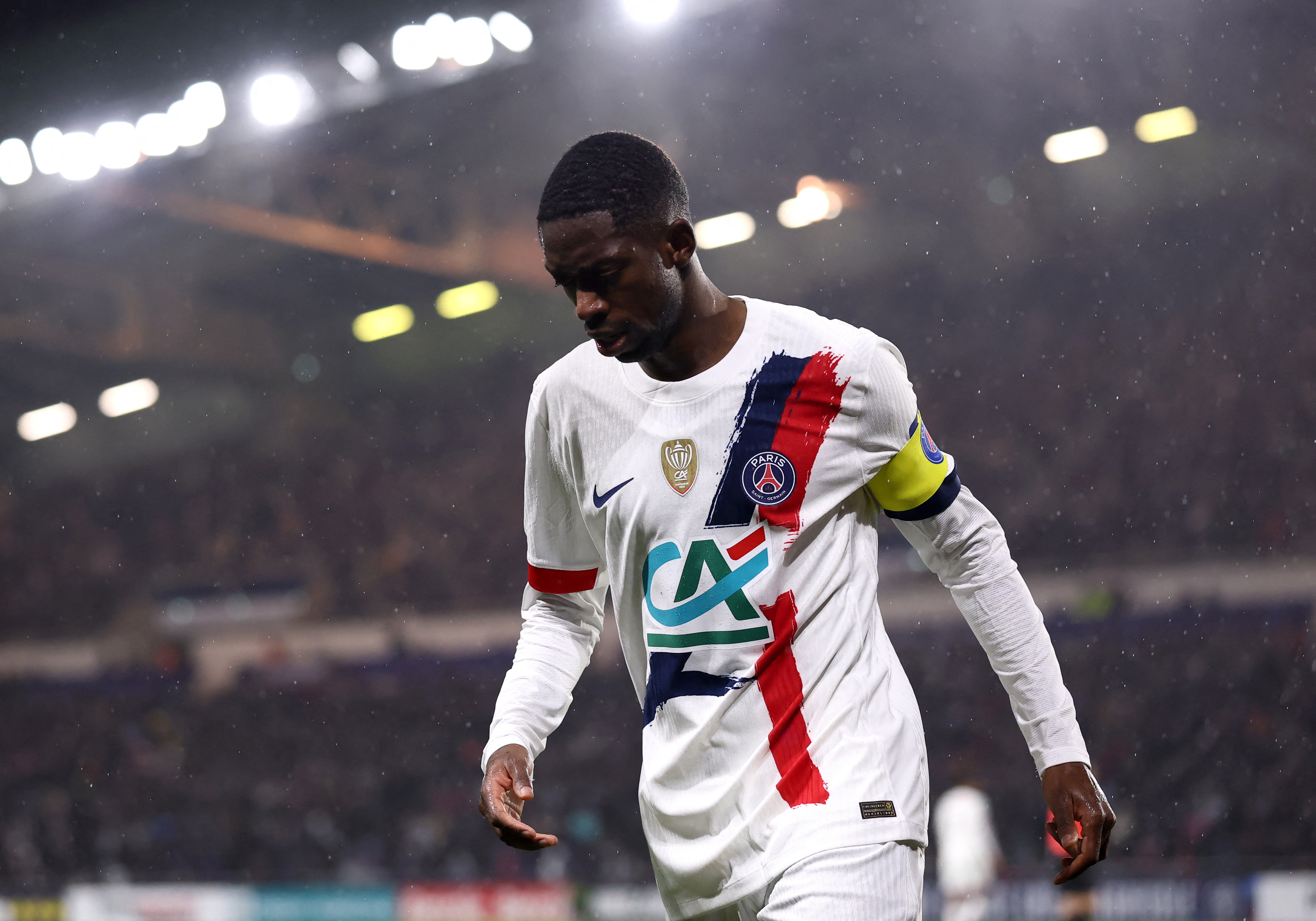 Soccer Football - Coupe de France - Round of 64 - Vendee Fontenay Foot v Paris St Germain - The Stade de la Beaujoire - Louis Fonteneau, Nantes, France - December 20, 2025 Paris St Germain's Ousmane Dembele looks on REUTERS/Stephane Mahe