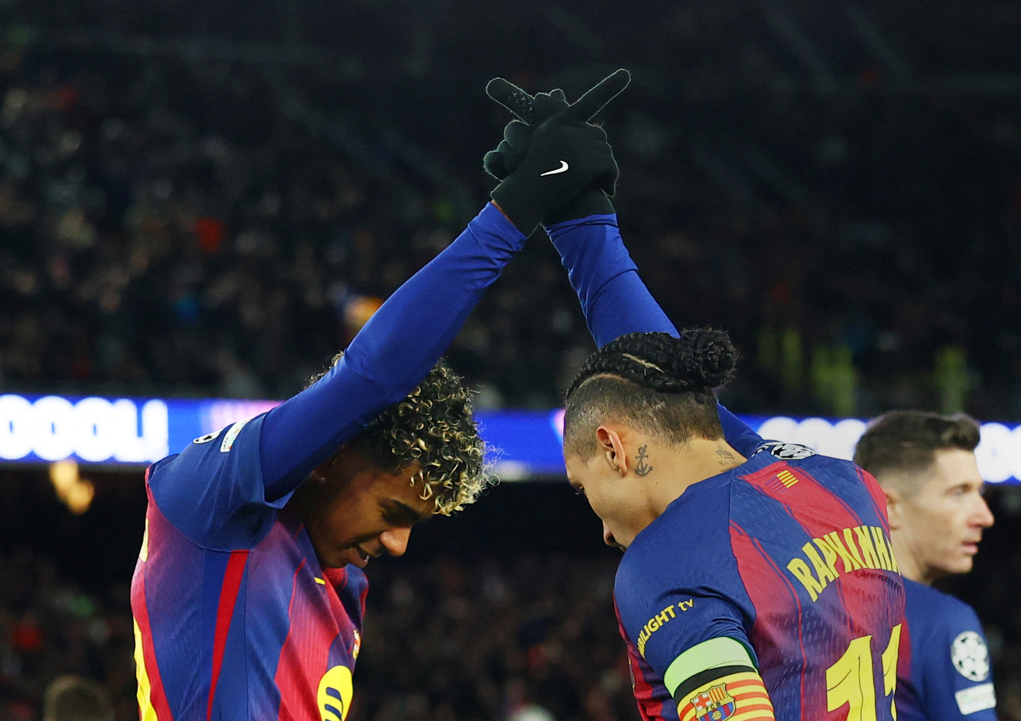 Soccer Football - UEFA Champions League - FC Barcelona v FC Copenhagen - Spotify Camp Nou, Barcelona, Spain - January 28, 2026 FC Barcelona's Raphinha celebrates scoring their third goal with  Lamine Yamal REUTERS/Albert Gea