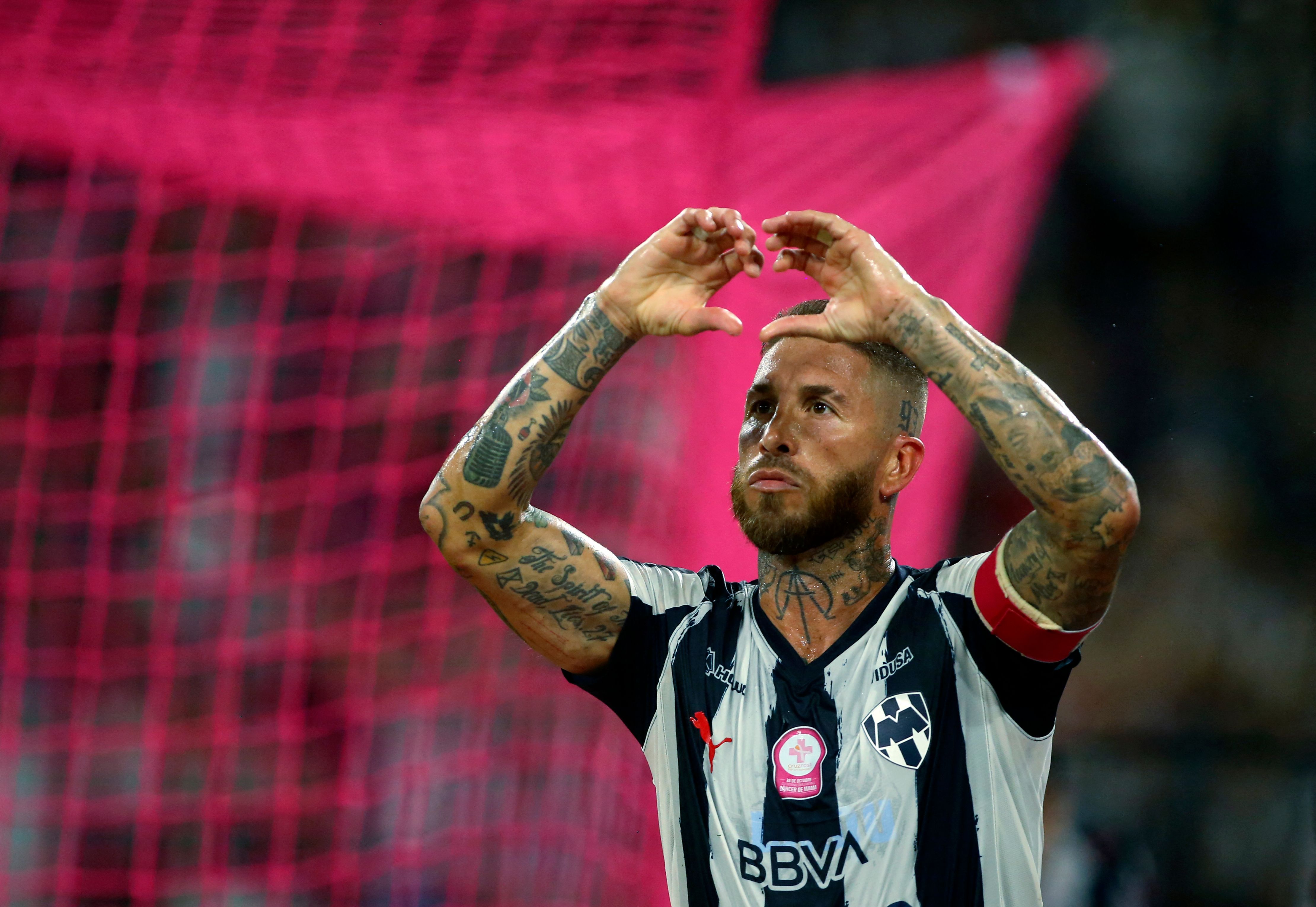 (FILES) Monterrey's Spanish defender #93 Sergio Ramos celebrates after scoring the equalising goal from the penalty spot during the Liga MX Apertura football tournament match between Monterrey and Pumas at BBVA Stadium in Monterrey, Nuevo Leon state, Mexico on October 18, 2025. Ramos confirmed late on December 6, 2025 that his time with Mexican club Rayados de Monterrey had come to an end, following their elimination in the semifinals of the 2025 Apertura tournament against Toluca. (Photo by Julio Cesar AGUILAR / AFP)