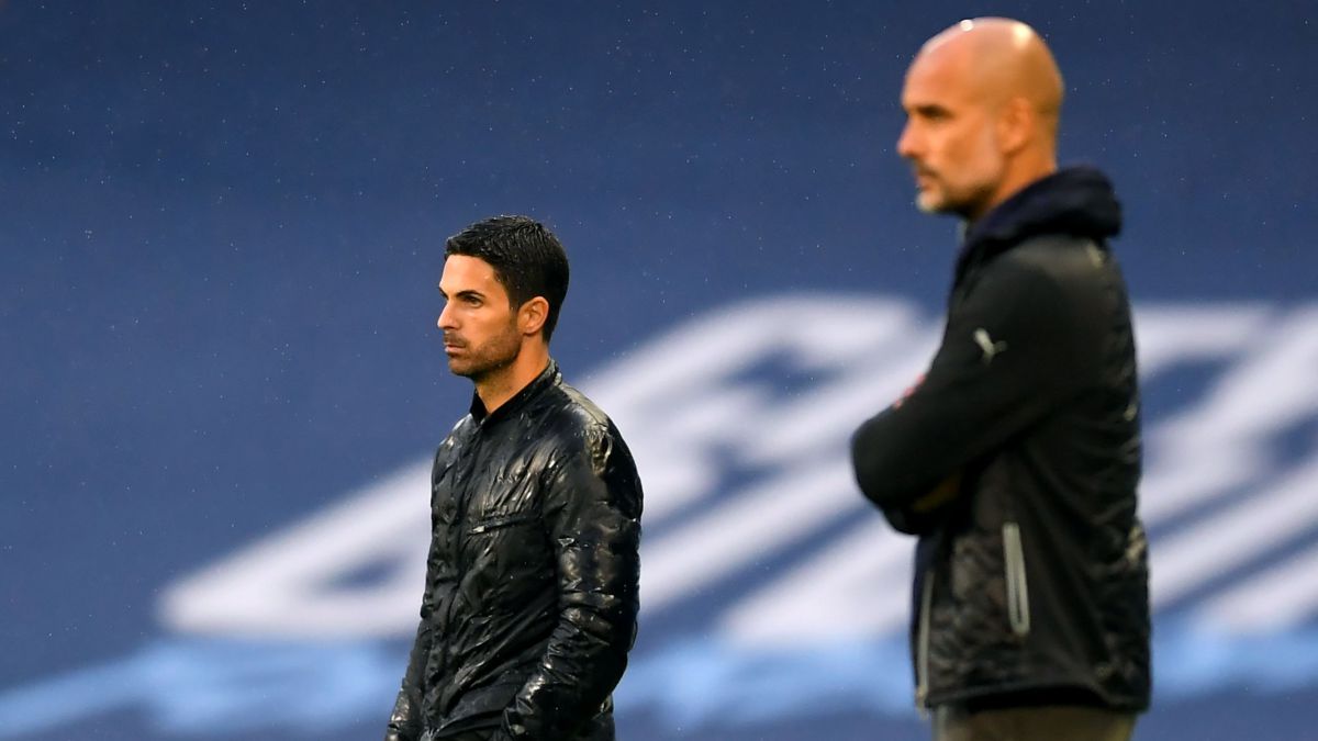 Mikel Arteta (L) and Pep Guardiola 