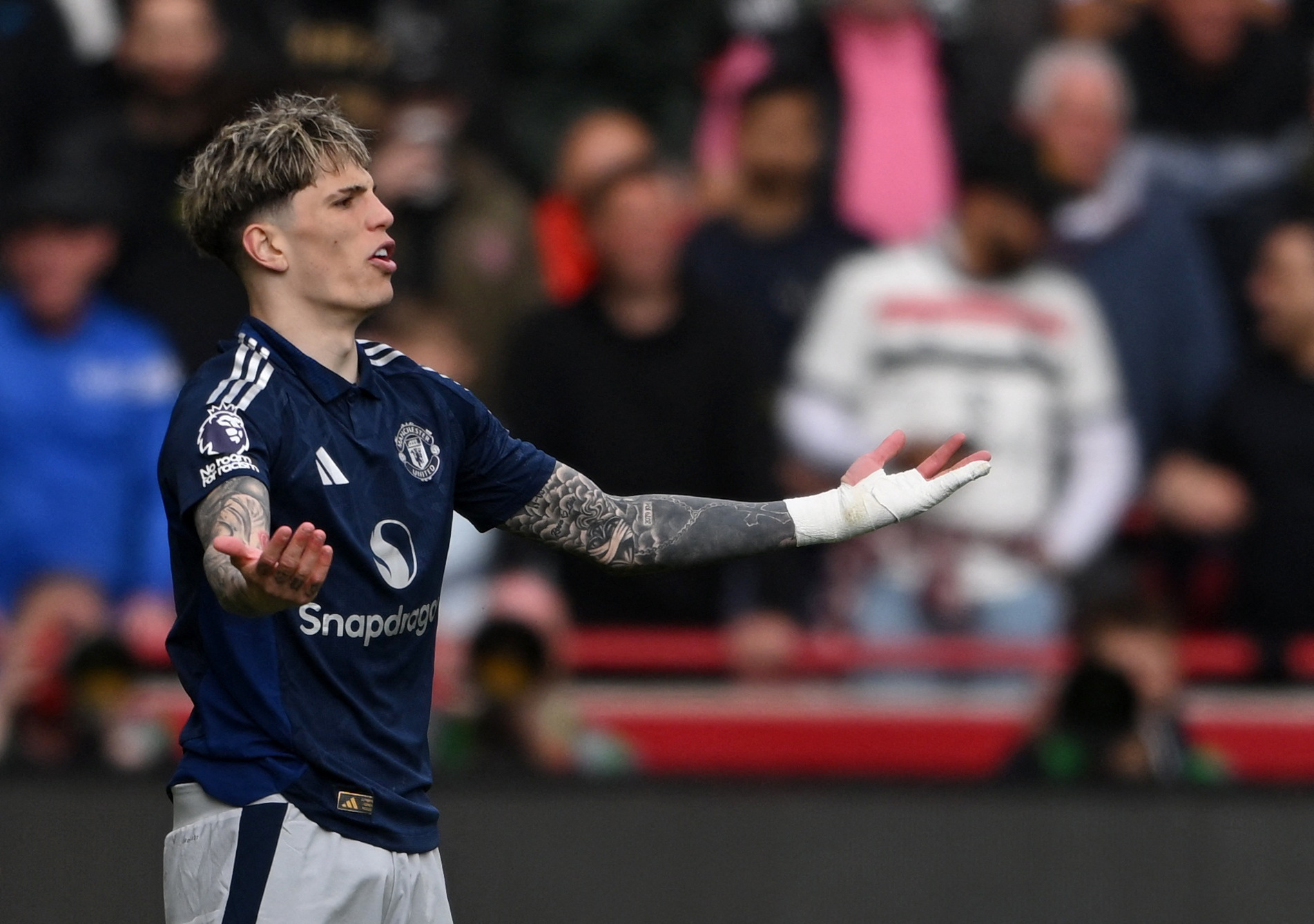 Soccer Football - Premier League - Brentford v Manchester United - GTech Community Stadium, London, Britain - May 4, 2025 Manchester United's Alejandro Garnacho reacts REUTERS/Jaimi Joy EDITORIAL USE ONLY. NO USE WITH UNAUTHORIZED AUDIO, VIDEO, DATA, FIXTURE LISTS, CLUB/LEAGUE LOGOS OR 'LIVE' SERVICES. ONLINE IN-MATCH USE LIMITED TO 120 IMAGES, NO VIDEO EMULATION. NO USE IN BETTING, GAMES OR SINGLE CLUB/LEAGUE/PLAYER PUBLICATIONS. PLEASE CONTACT YOUR ACCOUNT REPRESENTATIVE FOR FURTHER DETAILS..