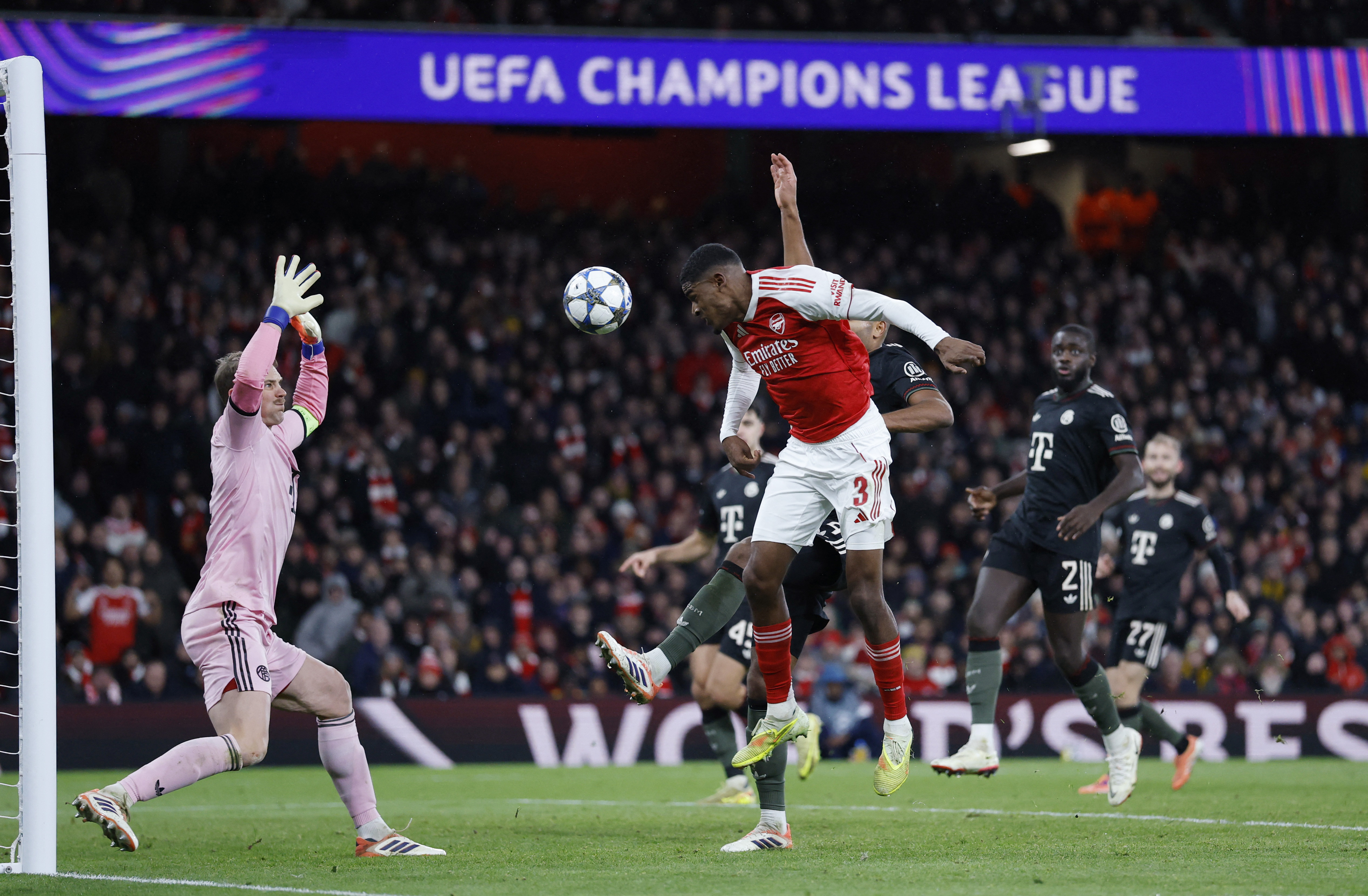 Soccer Football - UEFA Champions League - Arsenal v Bayern Munich - Emirates Stadium, London, Britain - November 26, 2025 Arsenal's Cristhian Mosquera heads at goal Action Images via Reuters/Peter Cziborra