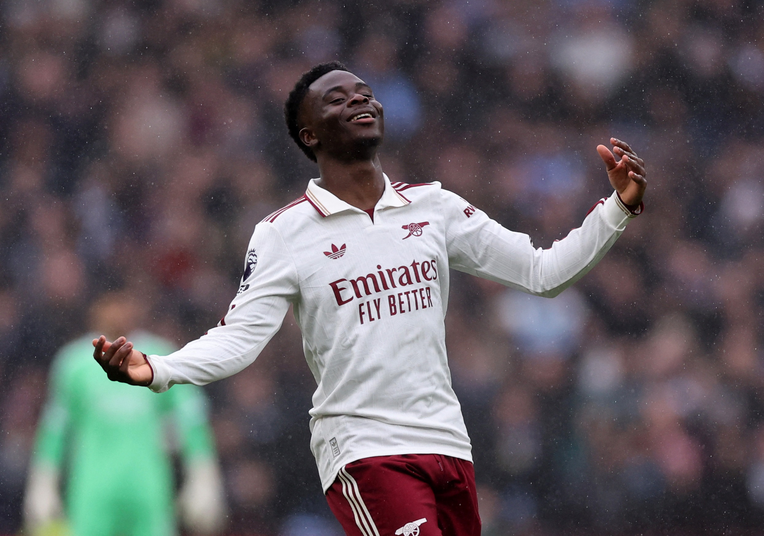 Soccer Football - Premier League - Aston Villa v Arsenal - Villa Park, Birmingham, Britain - December 6, 2025 Arsenal's Bukayo Saka reacts REUTERS/David Klein EDITORIAL USE ONLY. NO USE WITH UNAUTHORIZED AUDIO, VIDEO, DATA, FIXTURE LISTS, CLUB/LEAGUE LOGOS OR 'LIVE' SERVICES. ONLINE IN-MATCH USE LIMITED TO 120 IMAGES, NO VIDEO EMULATION. NO USE IN BETTING, GAMES OR SINGLE CLUB/LEAGUE/PLAYER PUBLICATIONS. PLEASE CONTACT YOUR ACCOUNT REPRESENTATIVE FOR FURTHER DETAILS..