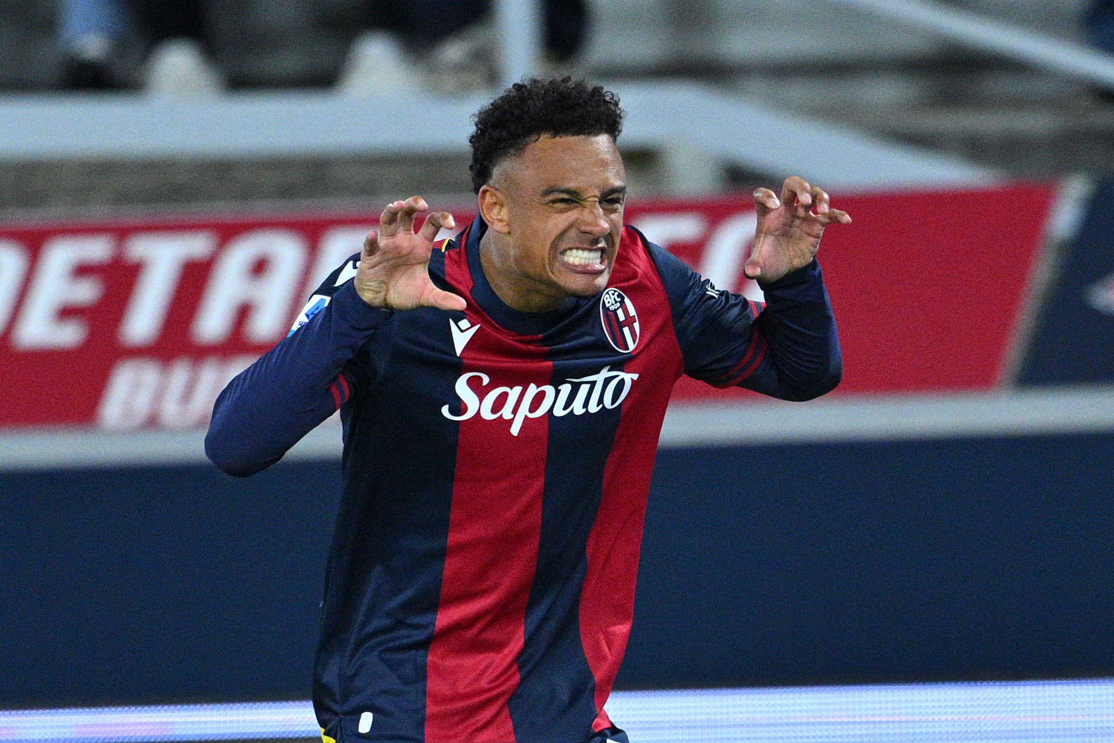 Bologna's Swiss forward #11 Dan Ndoye celebrates after scoring Bologna's first goal during the Italian Serie A football match between Bologna and Napoli at the Renato Dall'Ara stadium in Bologna on April 7, 2025. (Photo by Andreas SOLARO / AFP)