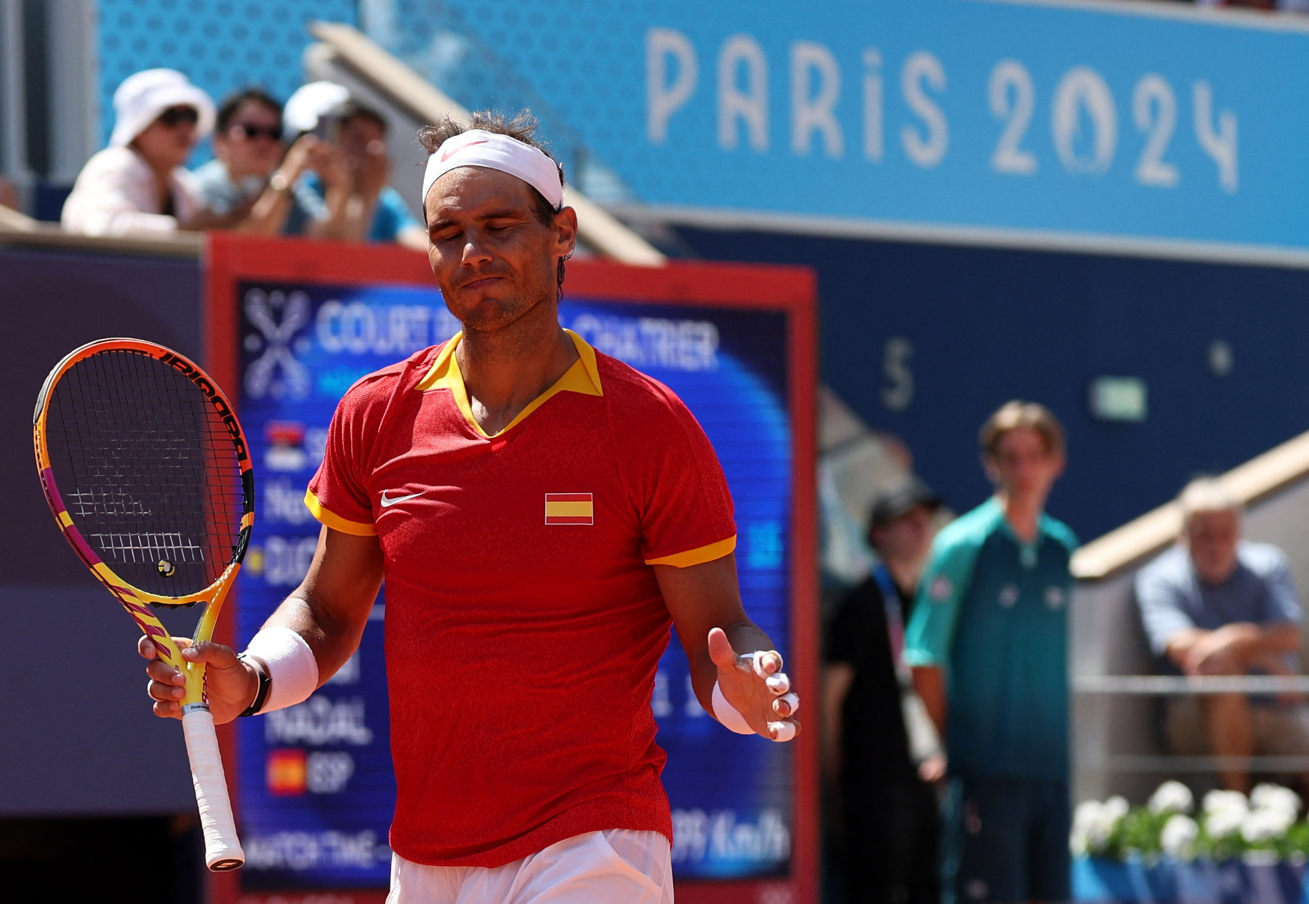 Paris 2024 Olympics - Tennis - Men's Singles Second Round - Roland-Garros Stadium, Paris, France - July 29, 2024. Rafael Nadal of Spain reacts during his match against Novak Djokovic of Serbia. REUTERS/Violeta Santos Moura