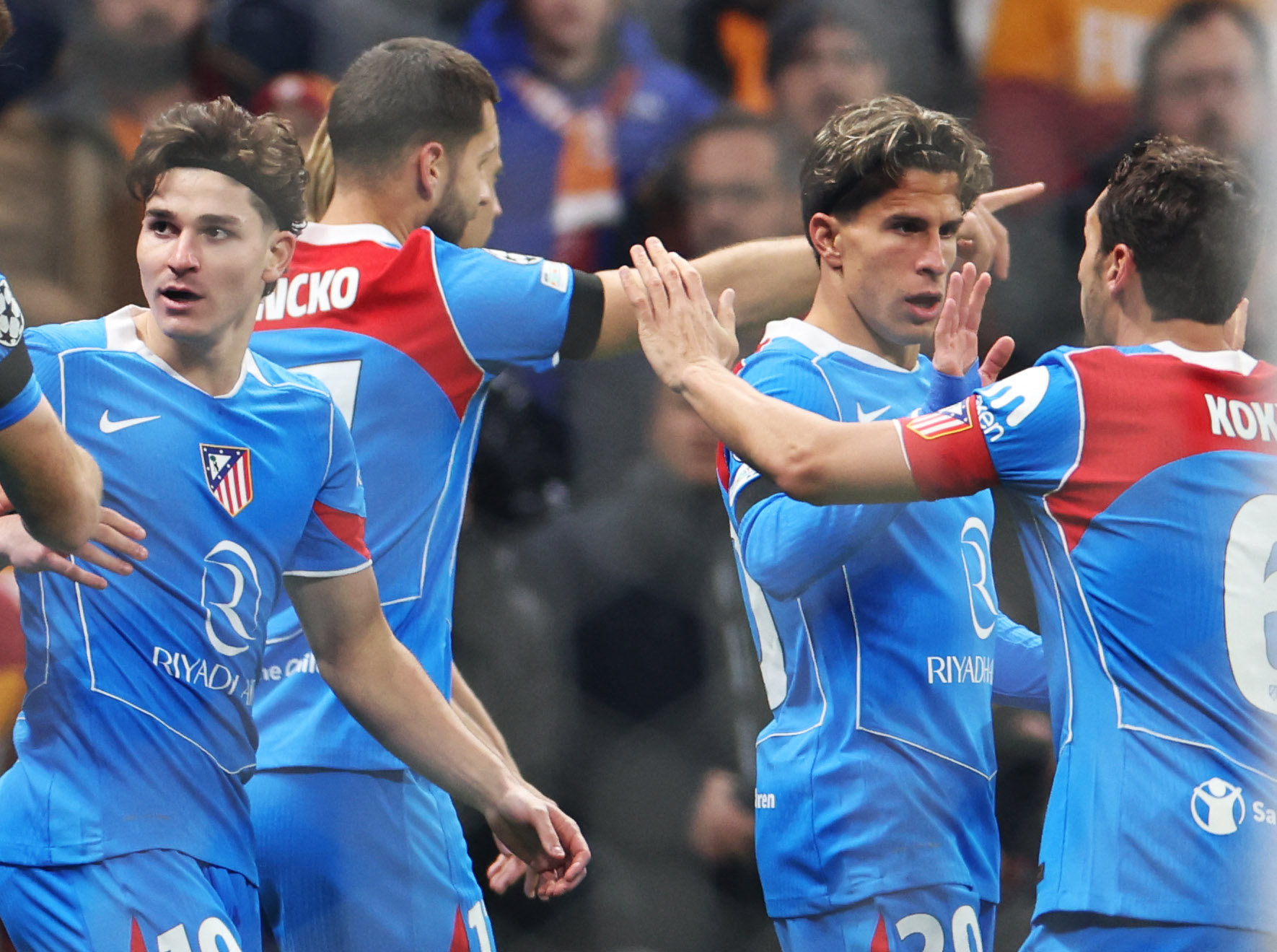 Soccer Football - UEFA Champions League - Galatasaray v Atletico Madrid - Rams Park, Istanbul, Turkey - January 21, 2026 Atletico Madrid's Giuliano Simeone celebrates scoring their first goal with Koke and Julian Alvarez REUTERS/Murad Sezer