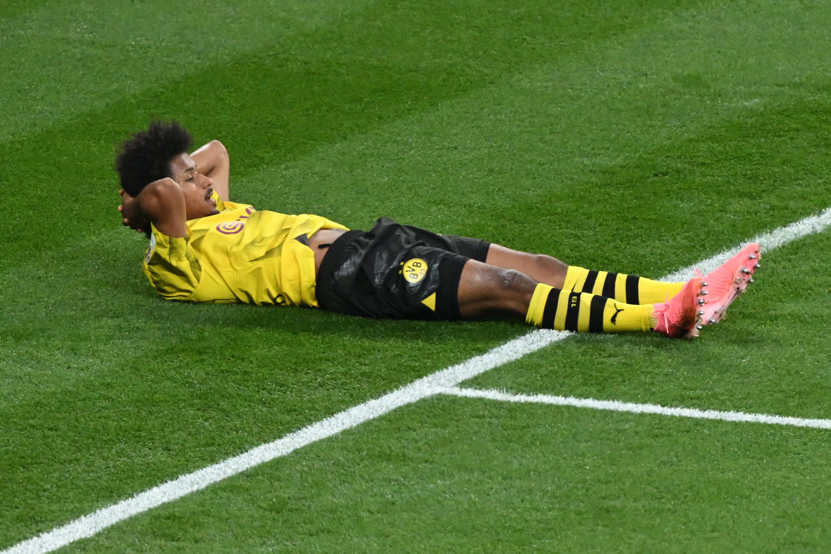 Dortmund's German forward #27 Karim Adeyemi reacts after a missed chance during the UEFA Champions League final football match between Borussia Dortmund and Real Madrid, at Wembley stadium, in London, on June 1, 2024. (Photo by JUSTIN TALLIS / AFP)