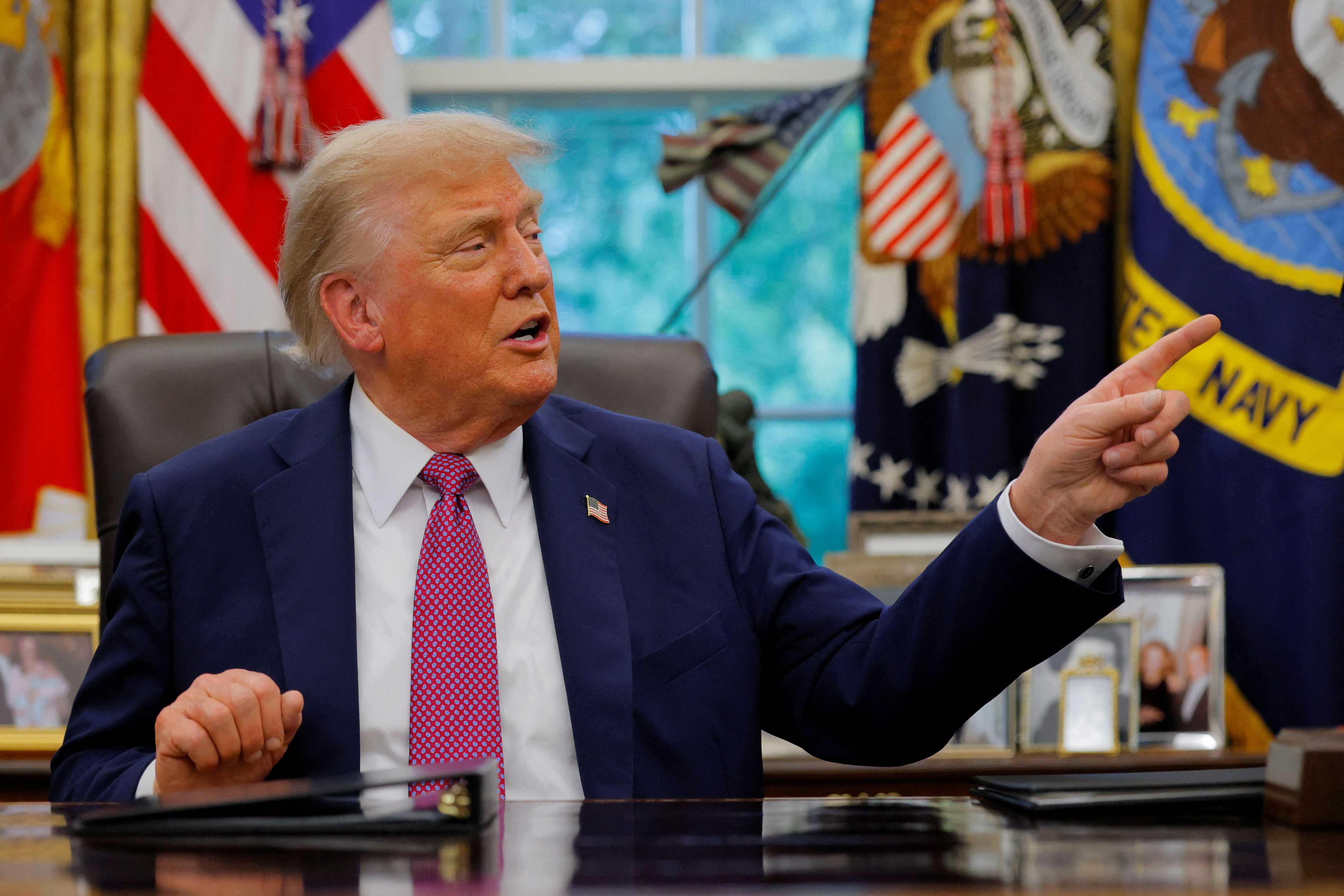 U.S. President Donald Trump speaks with the media in the Oval Office, at the White House in Washington, D.C., U.S., September 5, 2025. REUTERS/Brian Snyder