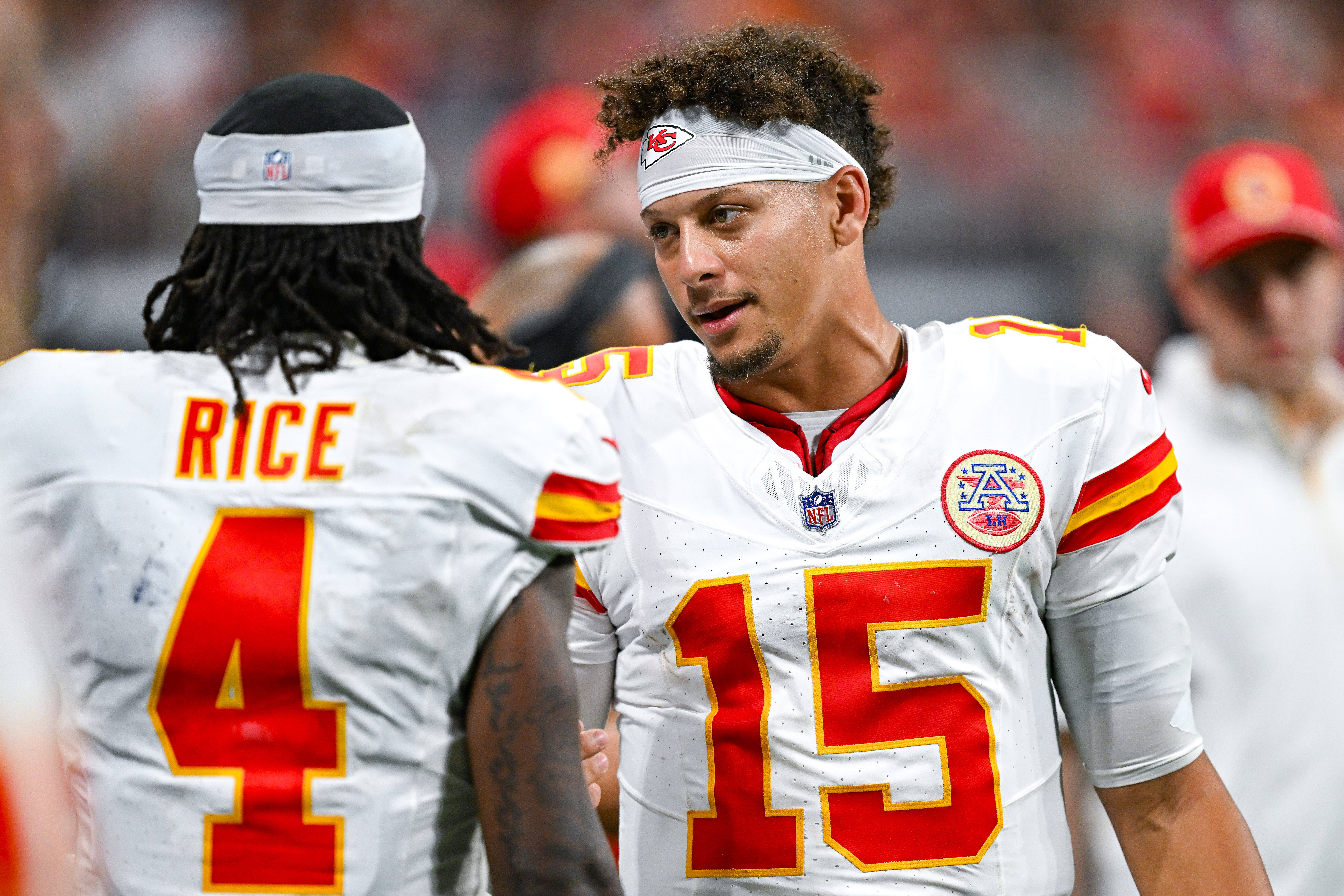 ATLANTA, GA  SEPTEMBER 22:  Kansas City quarterback Patrick Mahomes (15) talks with wide receiver Rashee Rice (4) during the NFL game between the Kansas City Chiefs and the Atlanta Falcons on September 22nd, 2024 at Mercedes-Benz Stadium in Atlanta, GA.  (Photo by Rich von Biberstein/Icon Sportswire via Getty Images)