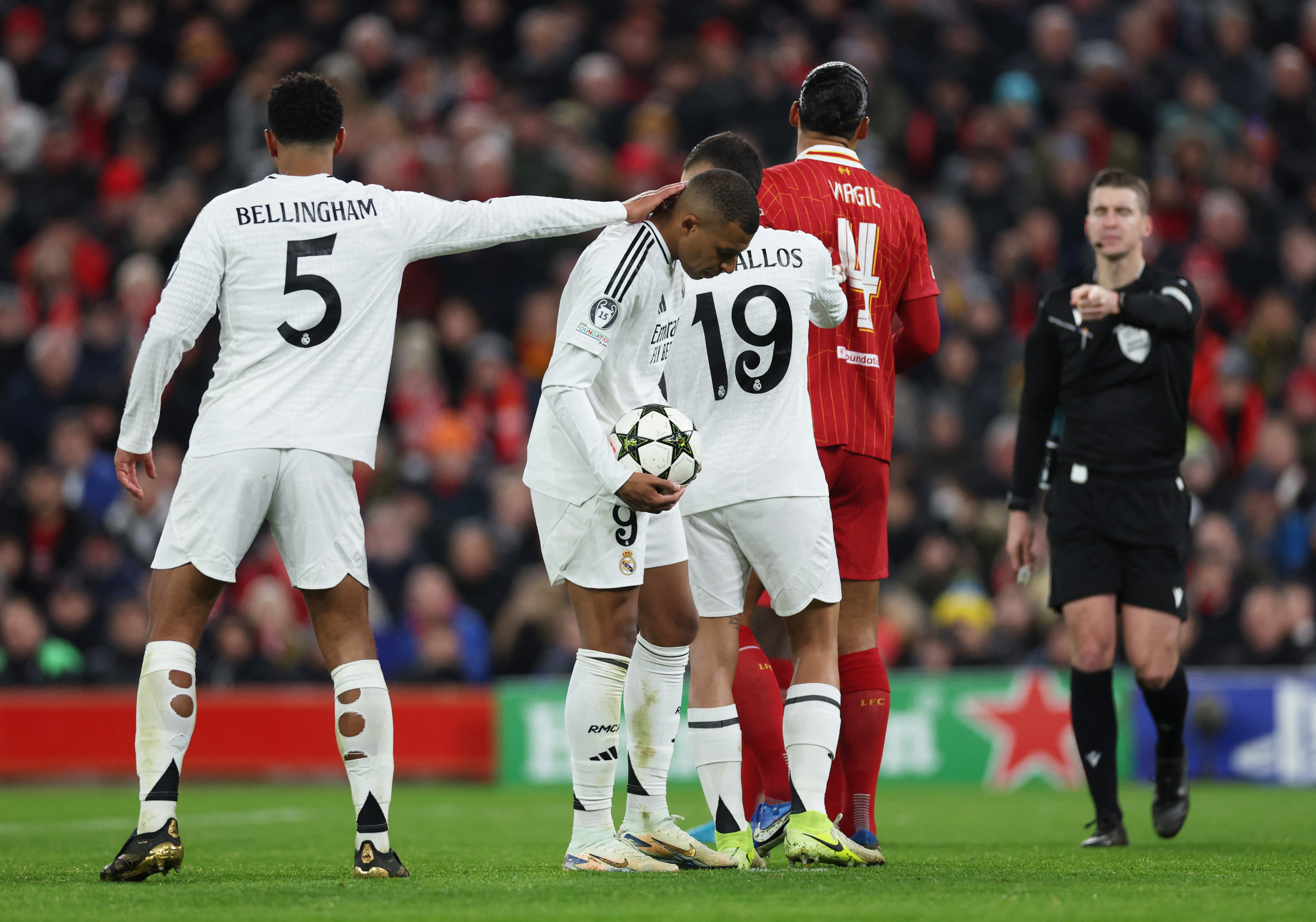 Soccer Football - Champions League - Liverpool v Real Madrid - Anfield, Liverpool, Britain - November 27, 2024 
Real Madrid's Kylian Mbappe before he takes a penalty kick Action Images via Reuters/Lee Smith