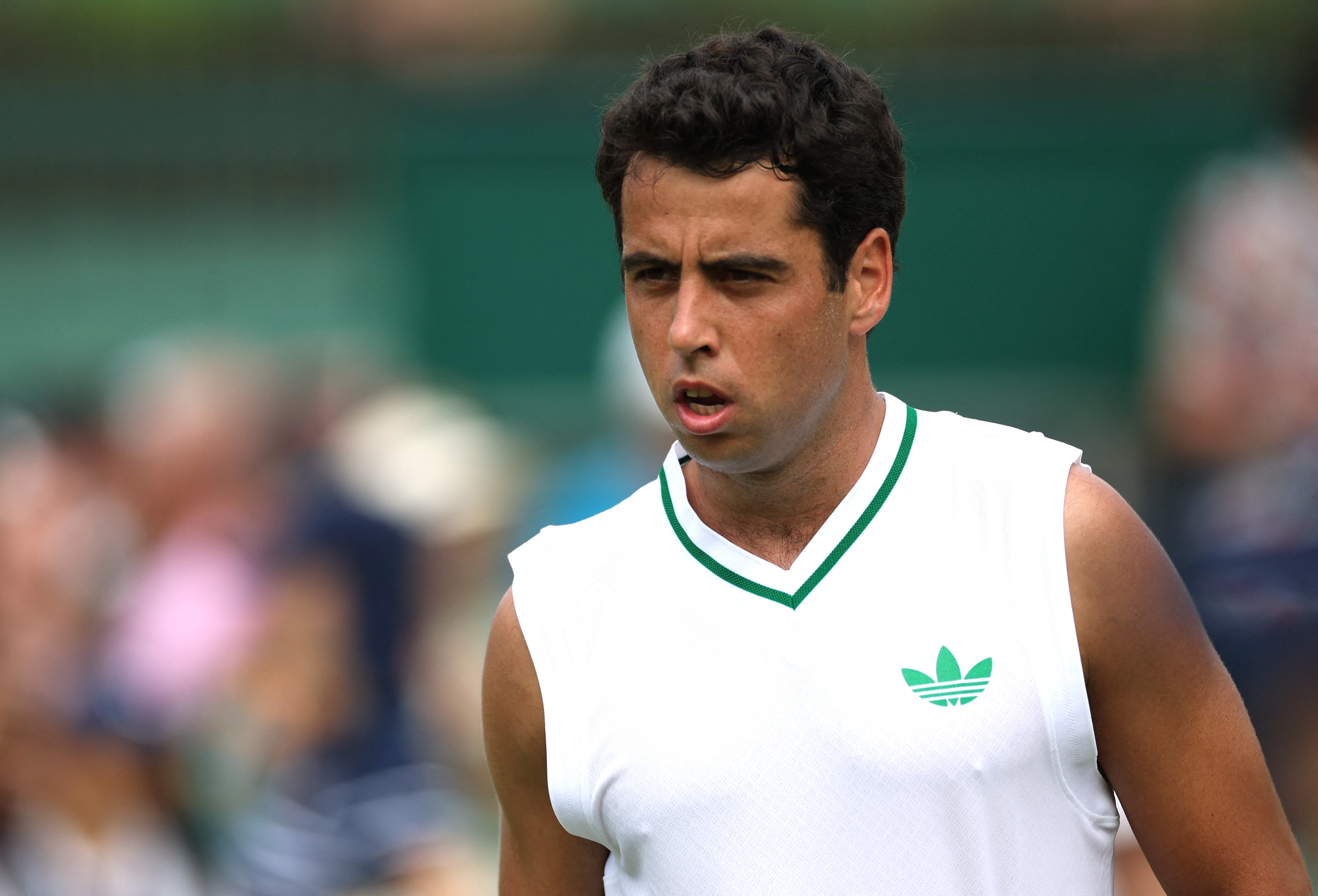 Tennis - Wimbledon - All England Lawn Tennis and Croquet Club, London, Britain - July 1, 2025 Spain's Jaume Munar in action during his first round match against Kazakhstan's Alexander Bublik REUTERS/Isabel Infantes
