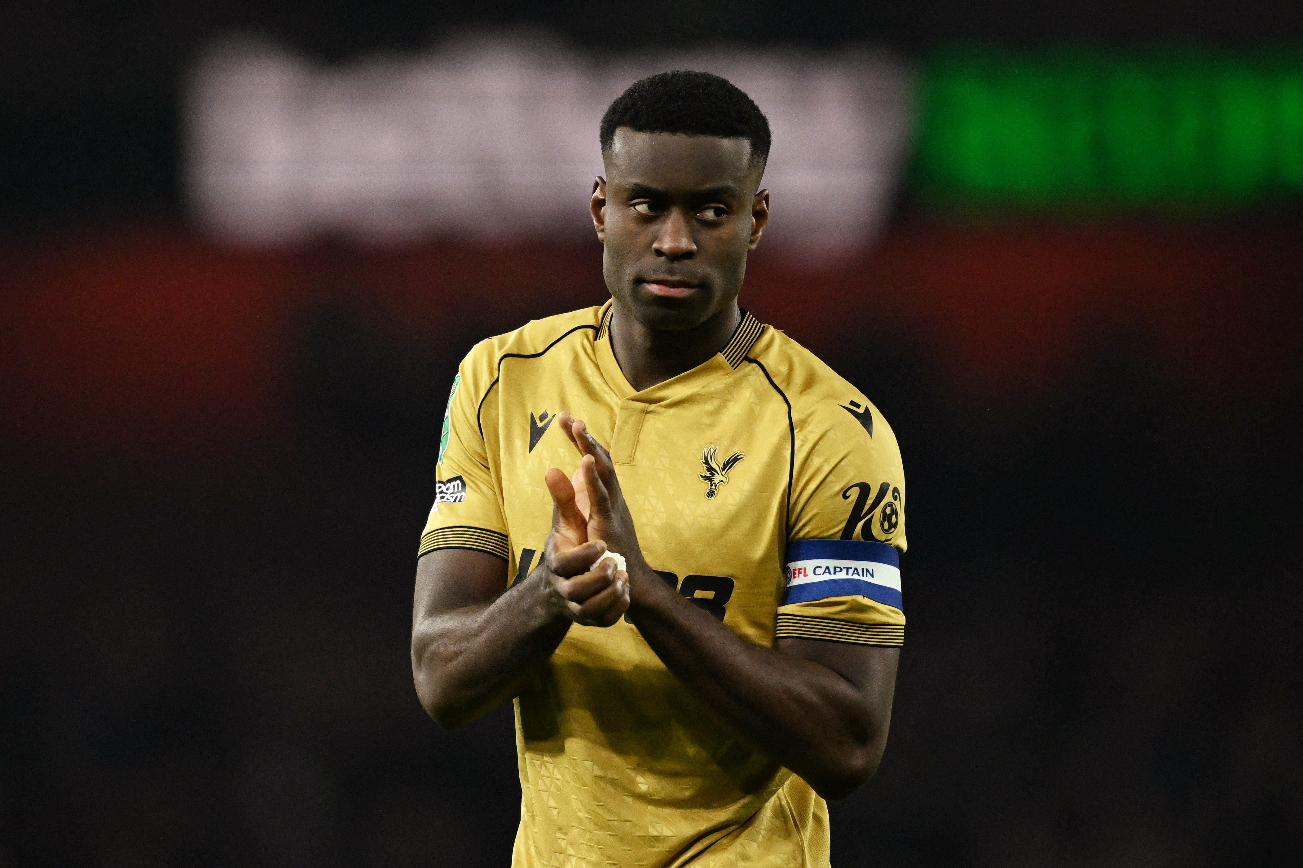 Soccer Football - Carabao Cup - Quarter Final - Arsenal v Crystal Palace - Emirates Stadium, London, Britain - December 23, 2025 Crystal Palace's Marc Guehi applauds fans after the match REUTERS/Dylan Martinez EDITORIAL USE ONLY. NO USE WITH UNAUTHORIZED AUDIO, VIDEO, DATA, FIXTURE LISTS, CLUB/LEAGUE LOGOS OR 'LIVE' SERVICES. ONLINE IN-MATCH USE LIMITED TO 120 IMAGES, NO VIDEO EMULATION. NO USE IN BETTING, GAMES OR SINGLE CLUB/LEAGUE/PLAYER PUBLICATIONS. PLEASE CONTACT YOUR ACCOUNT REPRESENTATIVE FOR FURTHER DETAILS..
