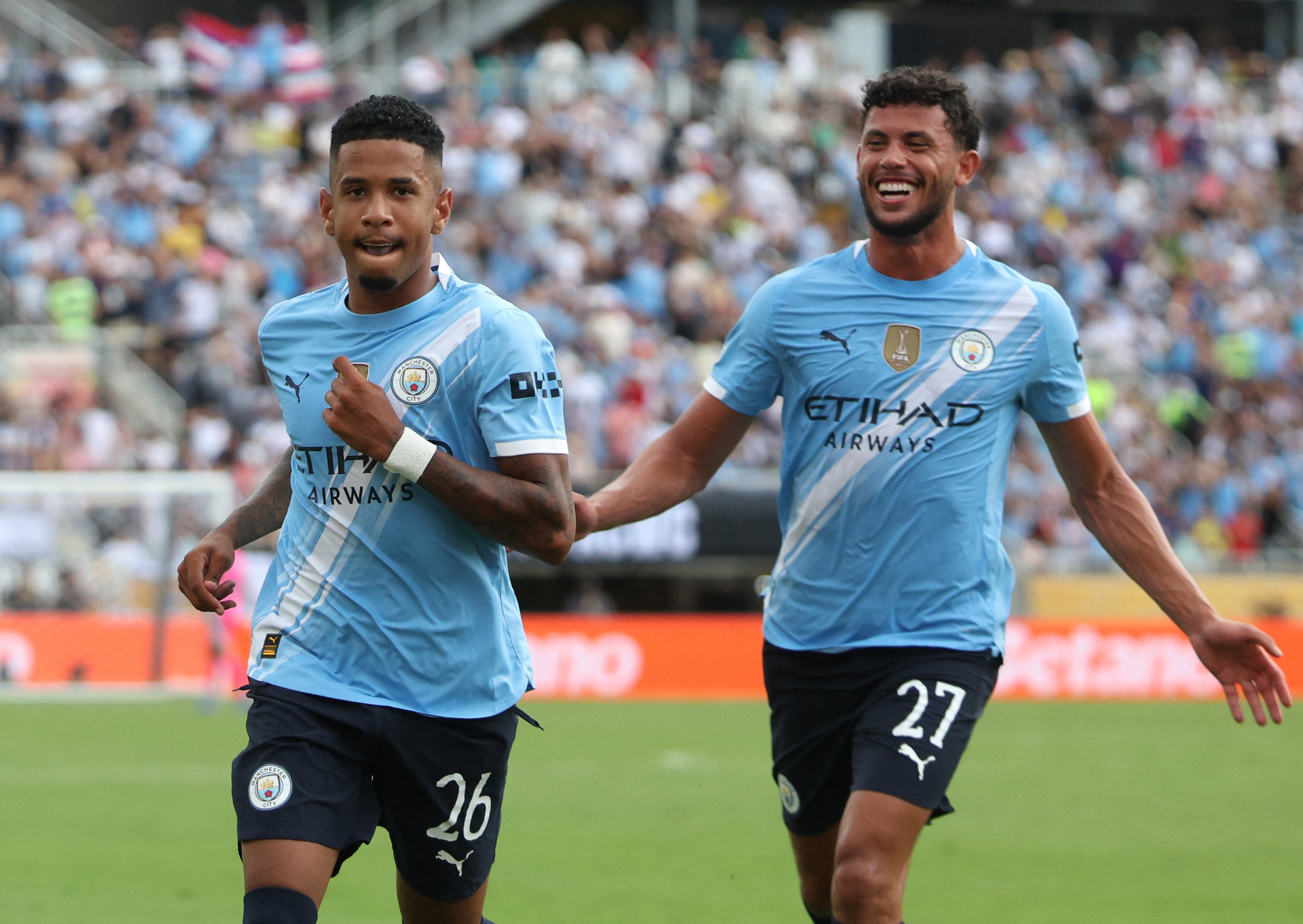 Soccer Football - FIFA Club World Cup - Group G - Juventus v Manchester City - Camping World Stadium, Orlando, Florida, U.S. - June 26, 2025  Manchester City's Savinho celebrates scoring their fifth goal with Manchester City's Matheus Nunes IMAGN IMAGES via Reuters/Nathan Ray Seebeck