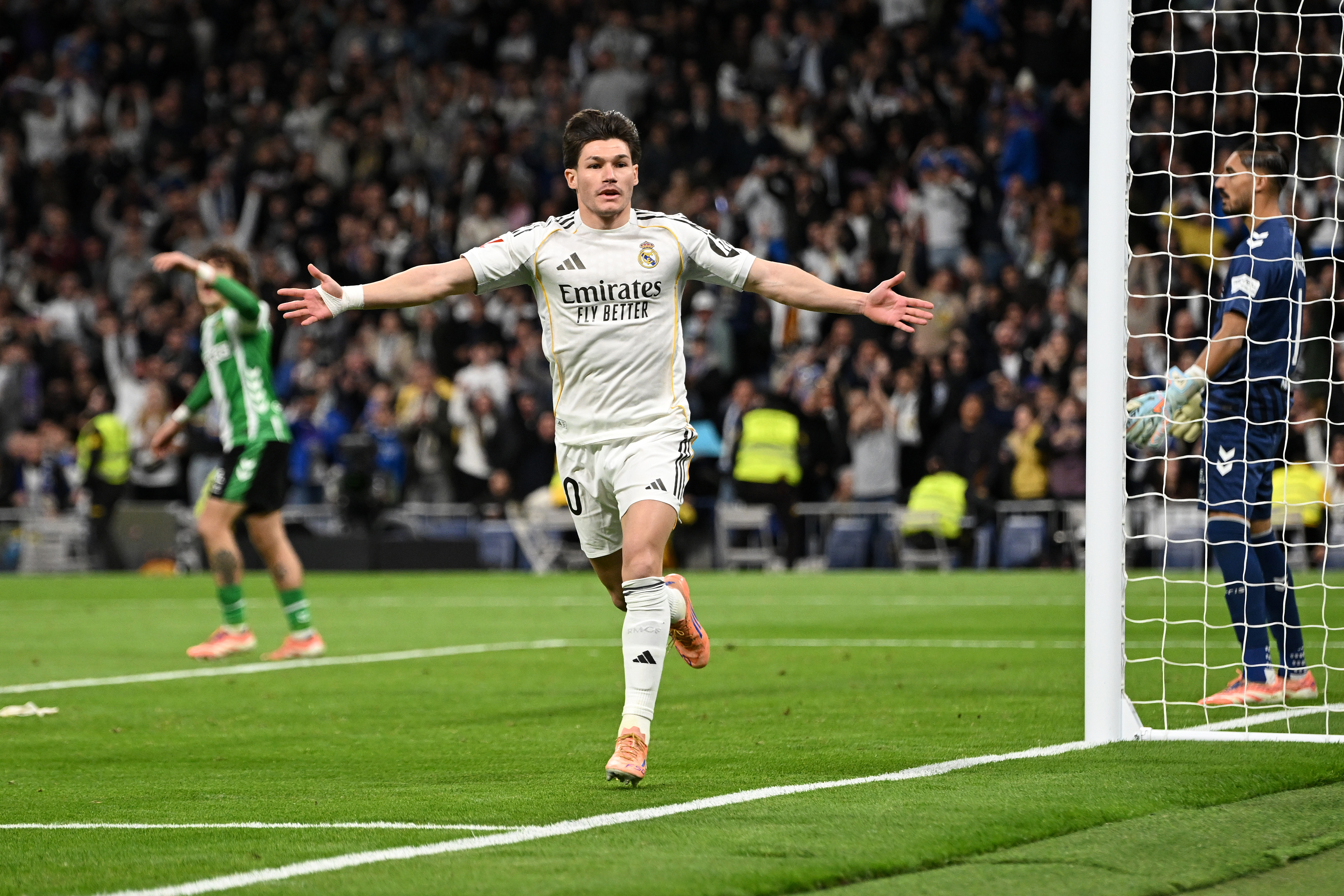 MADRID, SPAIN - JANUARY 04: Fran Garcia of Real Madrid celebrates scoring his team's fifth goal during the LaLiga EA Sports match between Real Madrid CF and Real Betis Balompie at Estadio Santiago Bernabeu on January 04, 2026 in Madrid, Spain. (Photo by Denis Doyle/Getty Images)