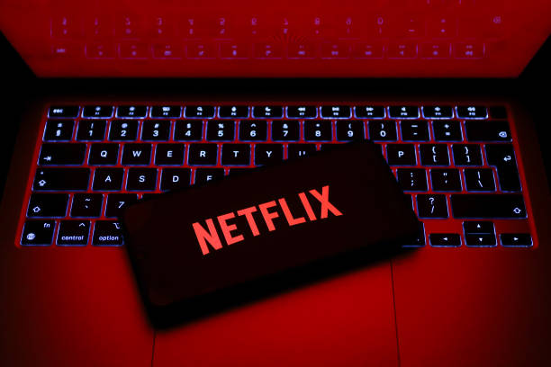 Netflix logo is displayed on a mobile phone screen for illustration photo. Krakow, Poland on January 23, 2023. (Photo by Beata Zawrzel/NurPhoto via Getty Images)