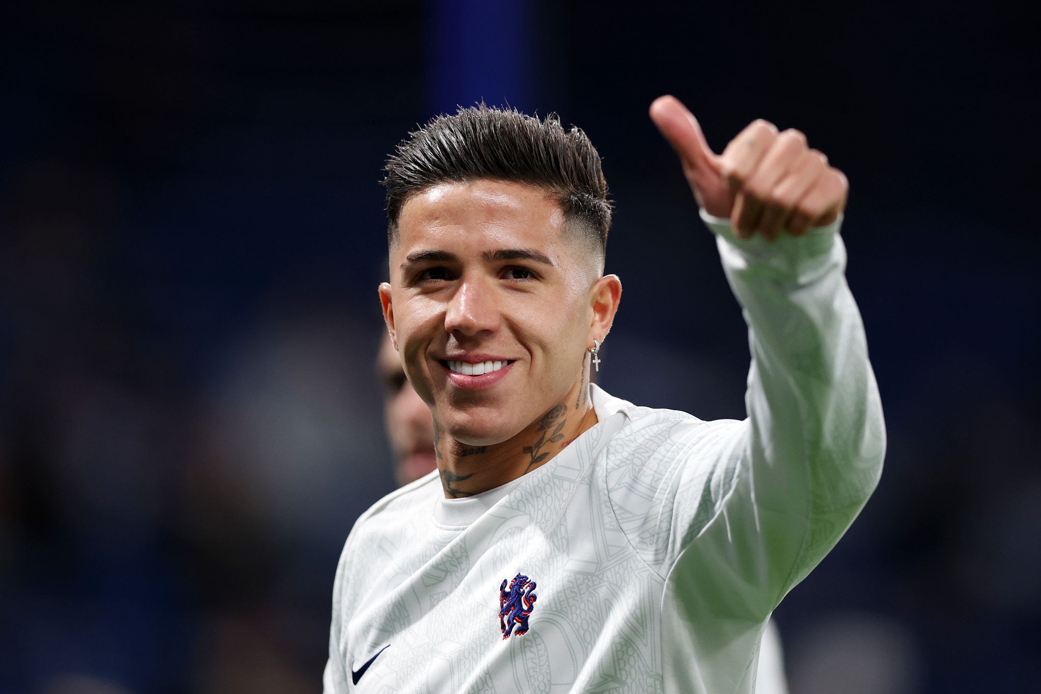 LONDON, ENGLAND - DECEMBER 27: Enzo Fernandez of Chelsea gives a thumbs up as the team warms up prior to the Premier League match between Chelsea and Aston Villa at Stamford Bridge on December 27, 2025 in London, England. (Photo by Luke Walker/Getty Images)