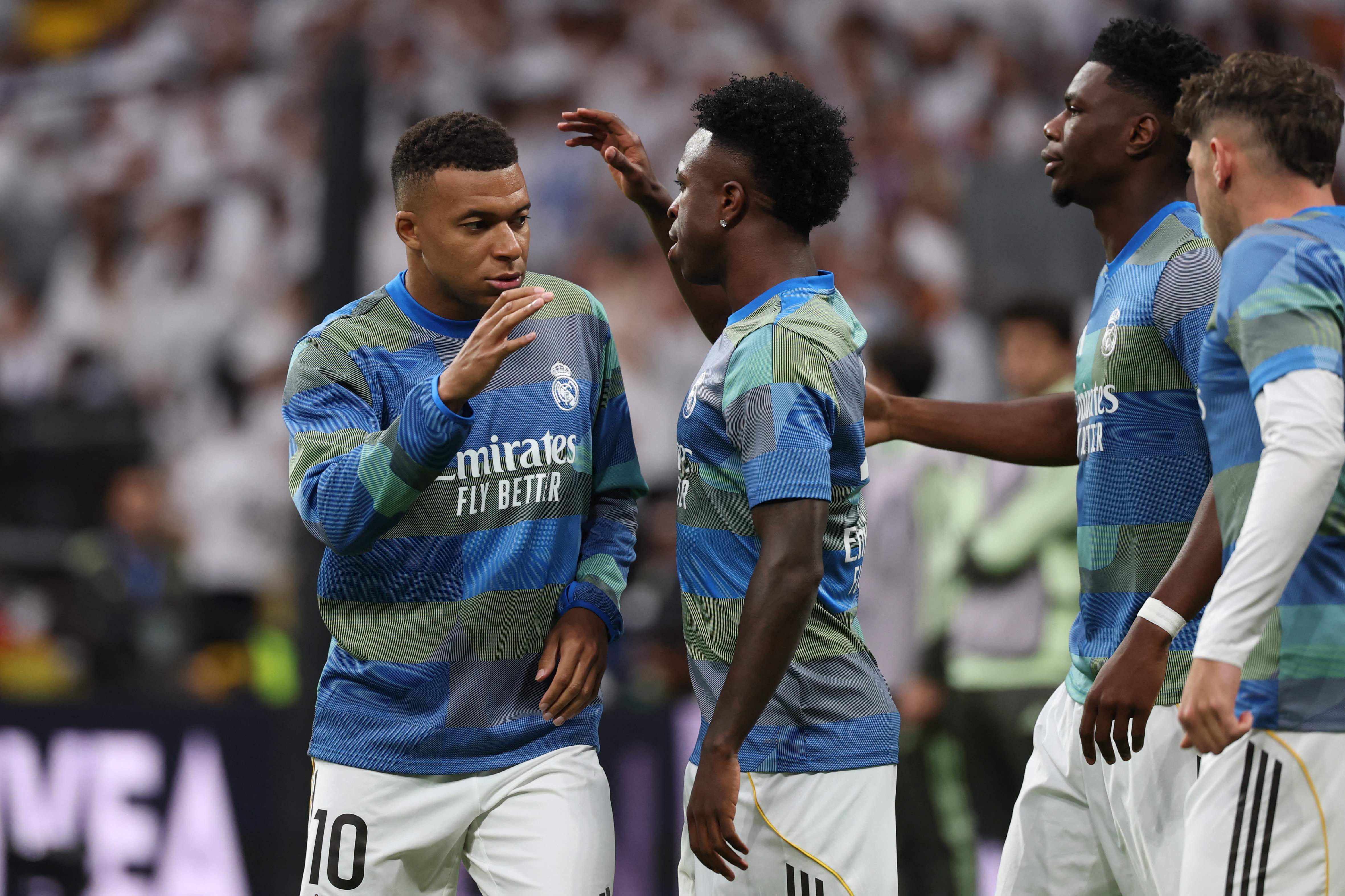 Real Madrid and Barcelona players prepare for kick-off