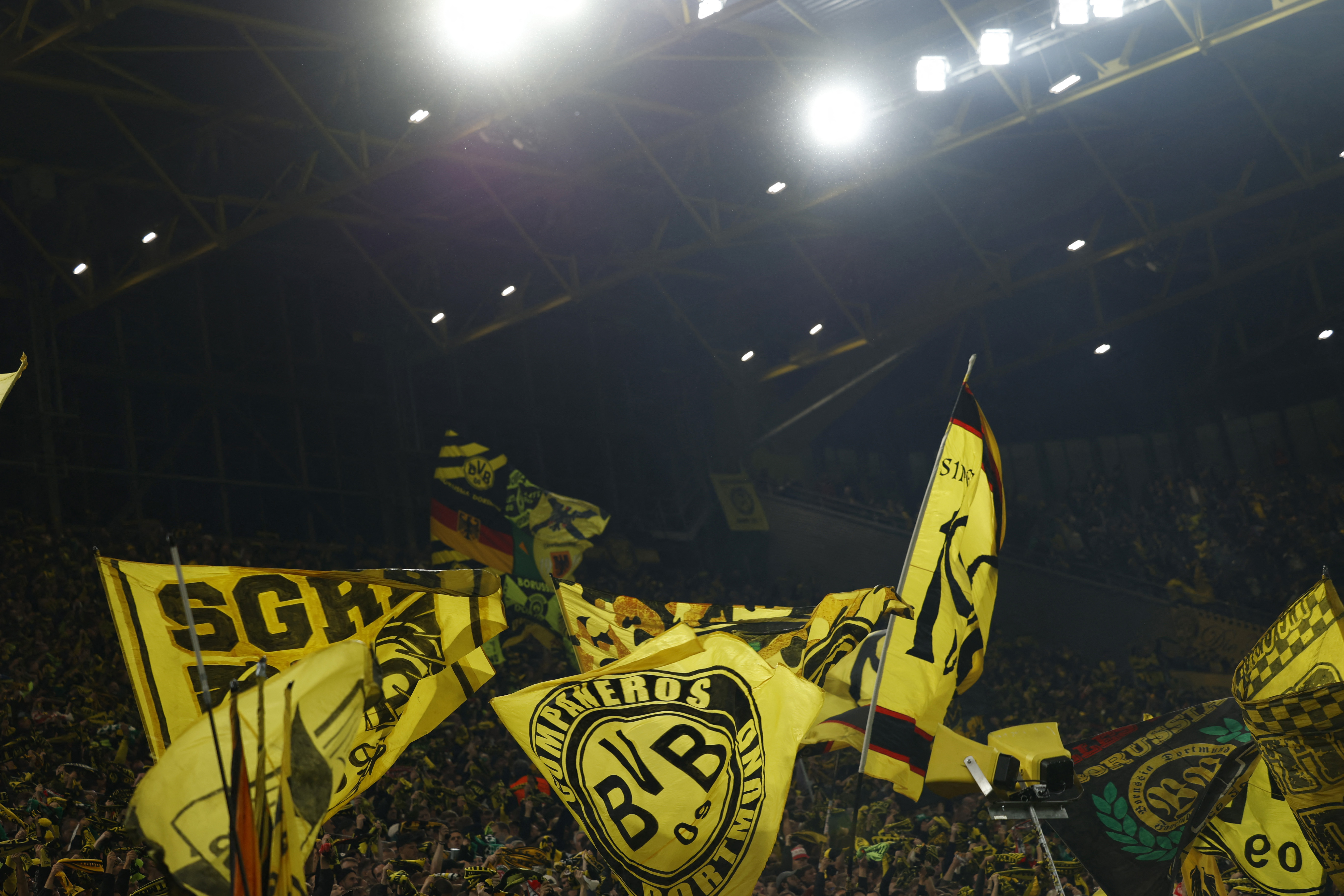 Soccer Football - Champions League - Borussia Dortmund v Celtic - Signal Iduna Park, Dortmund, Germany - October 1, 2024  Borussia Dortmund fans inside the stadium wave flags before the match REUTERS/Leon Kuegeler