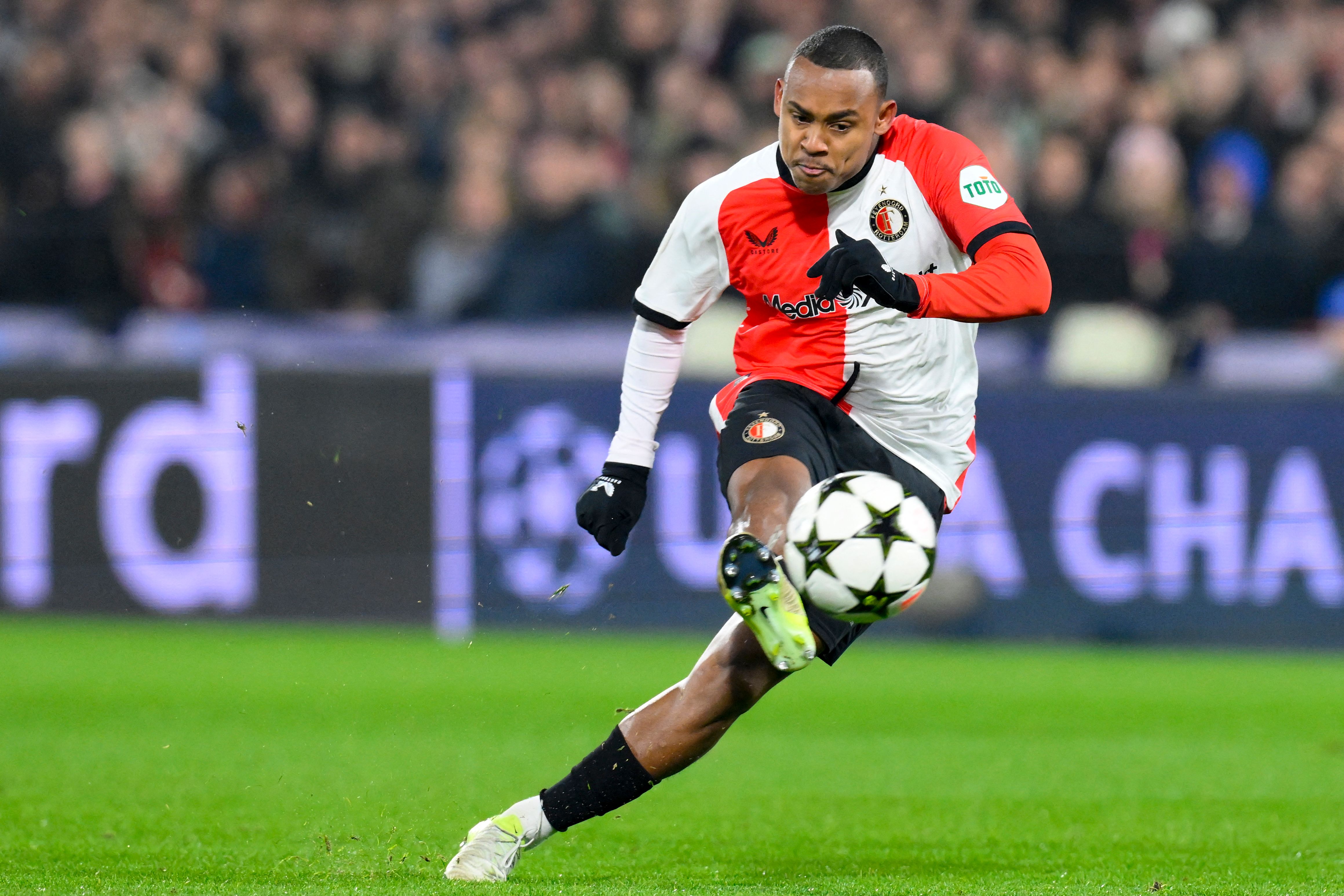 Feyenoord's Brazilian forward #14 Igor Paixao shoots to score his team's second goal during the UEFA Champions League, league phase football match between Feyenoord and Sparta Praha at the Stadion Feijenoord 'De Kuip' in Rotterdam, on December 11, 2024. (Photo by JOHN THYS / AFP)