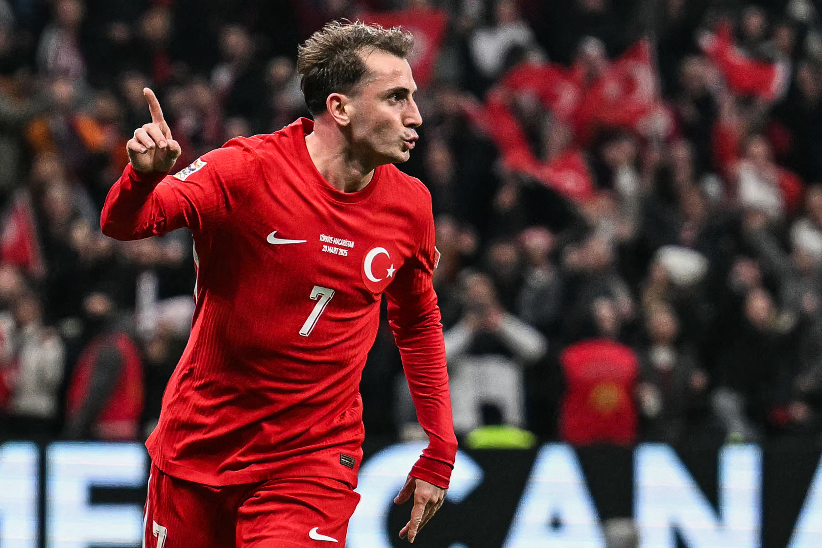 Turkey's forward #07 Kerem Akturkoglu celebrates after scoring his team's second goal during the UEFA Nations League playoff first-leg football match between Turkey and Hungary at the Rams Park Ali Samiyen Sport Complex Stadium in Istanbul on March 20, 2025. (Photo by Ozan KOSE / AFP)