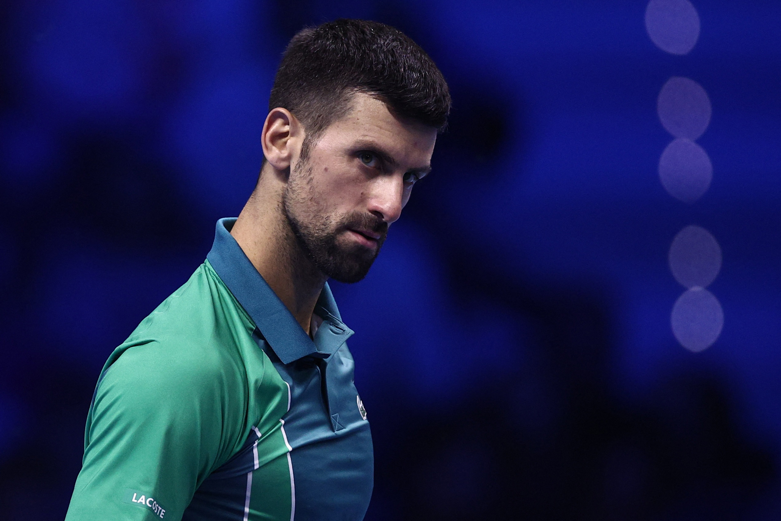 Tennis - ATP Finals - Pala Alpitour, Turin, Italy - November 19, 2023  Serbia's Novak Djokovic reacts during the final against Italy's Jannik Sinner REUTERS/Guglielmo Mangiapane