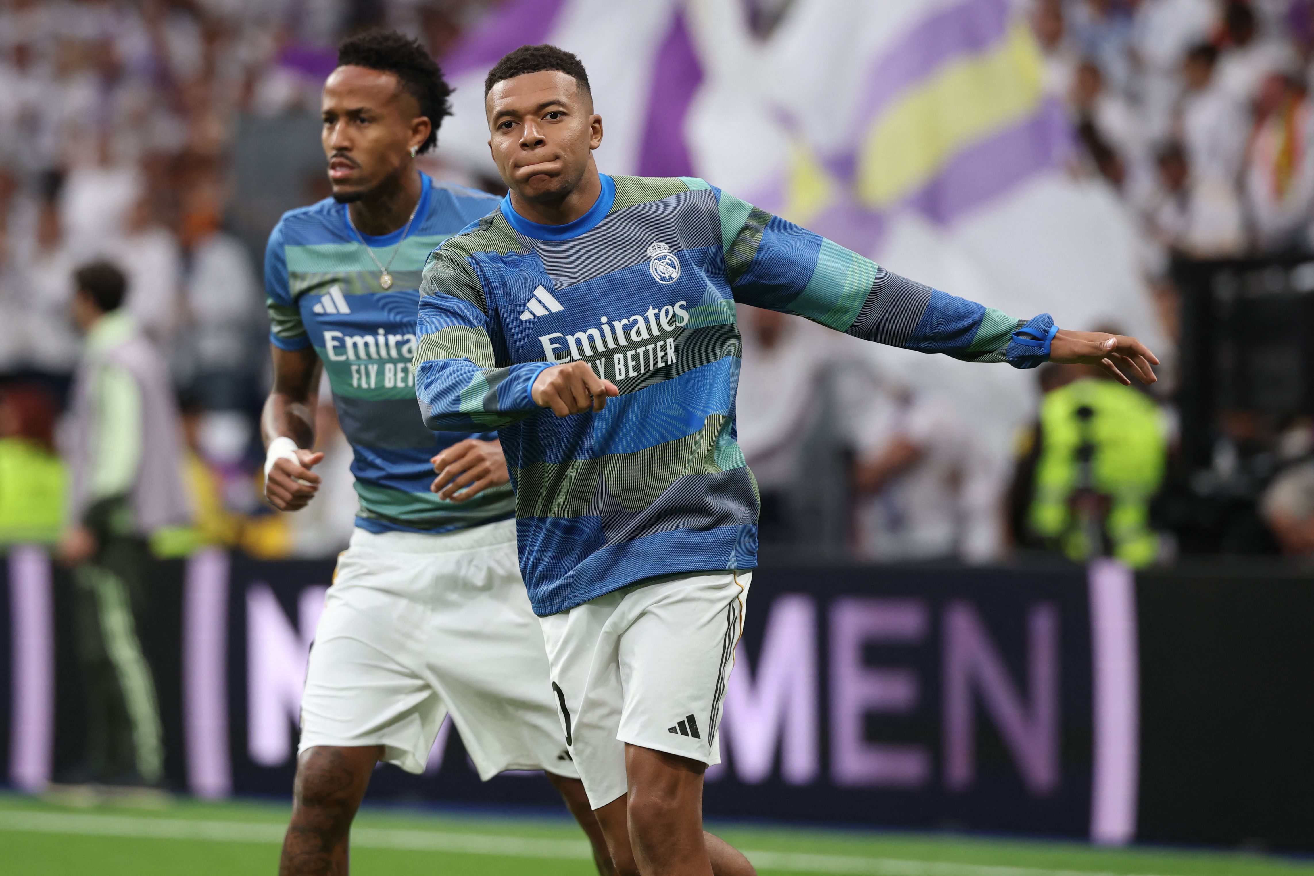 Real Madrid and Barcelona players prepare for kick-off