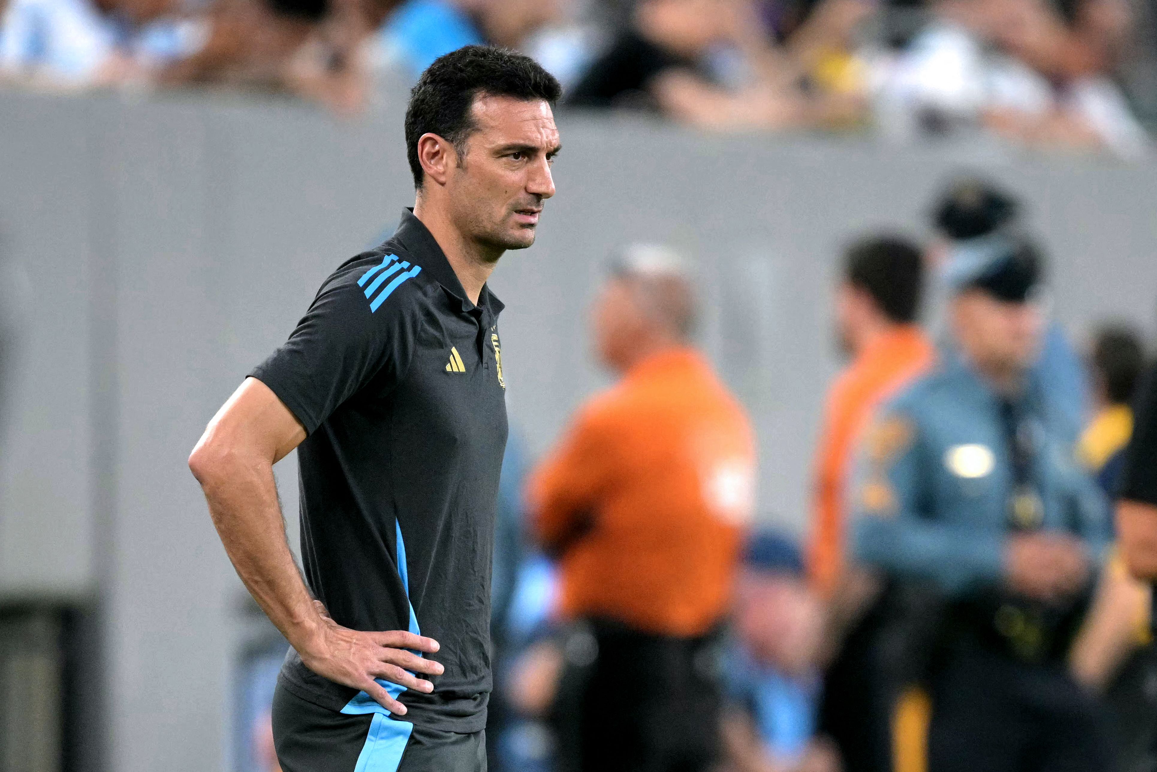 Argentina's coach Lionel Scaloni watches his players from the touchline during the Conmebol 2024 Copa America tournament semi-final football match between Argentina and Canada at MetLife Stadium, in East Rutherford, New Jersey on July 9, 2024. (Photo by JUAN MABROMATA / AFP)