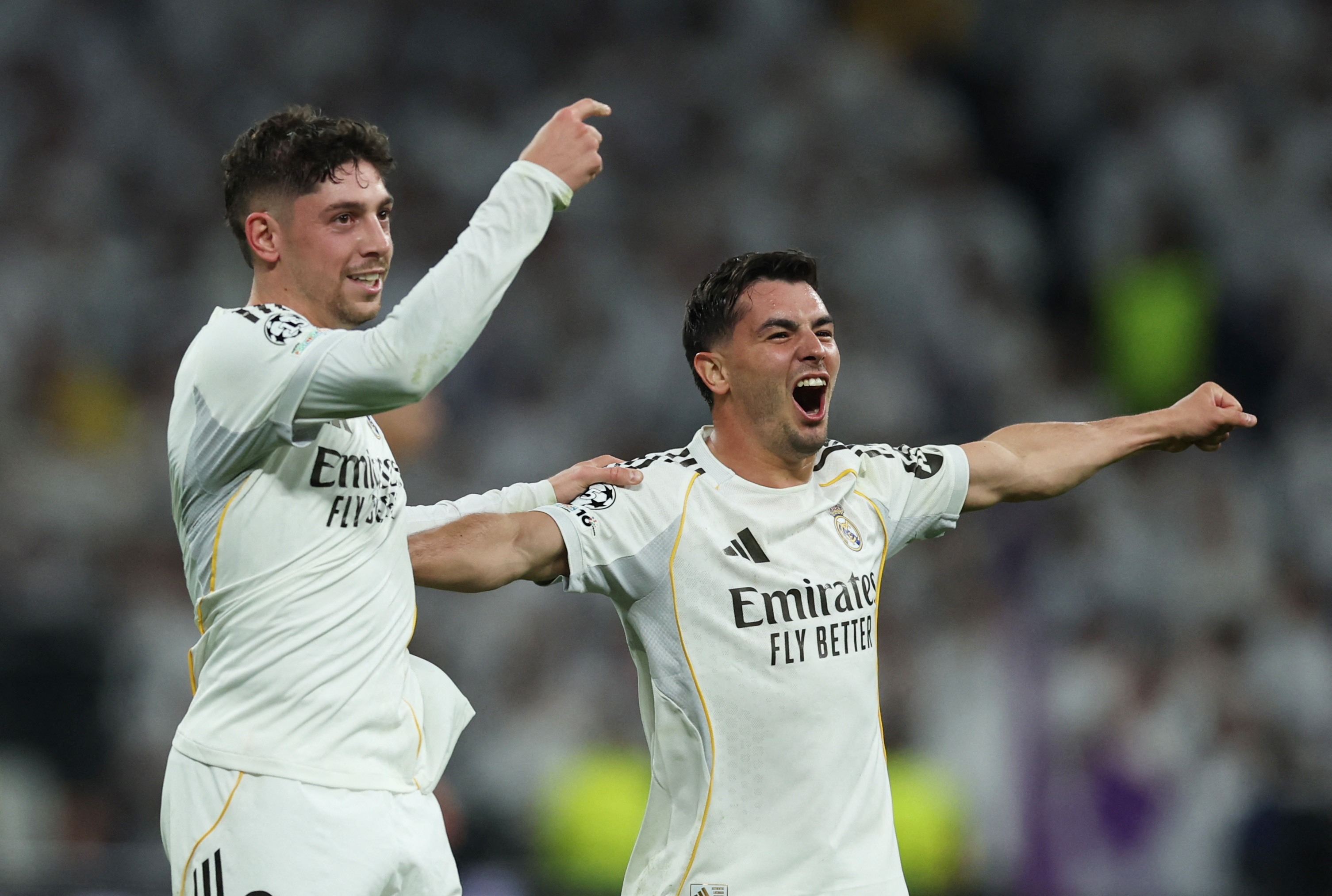 Soccer Football - UEFA Champions League - Round of 16 - First Leg - Real Madrid v Manchester City - Santiago Bernabeu, Madrid, Spain - March 11, 2026 Real Madrid's Federico Valverde celebrates scoring their third goal to complete a hat-trick with Brahim Diaz REUTERS/Violeta Santos Moura