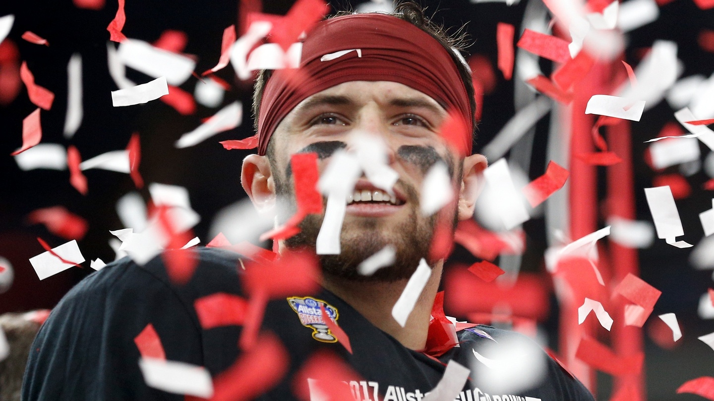 Oklahoma captains brought Baker Mayfield's jersey to the coin toss