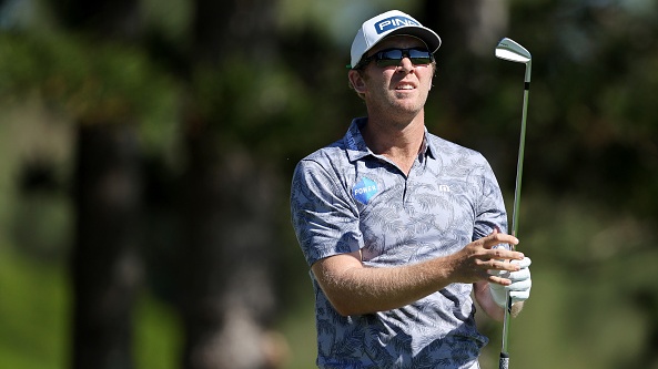 Lucas Glover and Mickey Mouse hold the trophy after the final round News  Photo - Getty Images